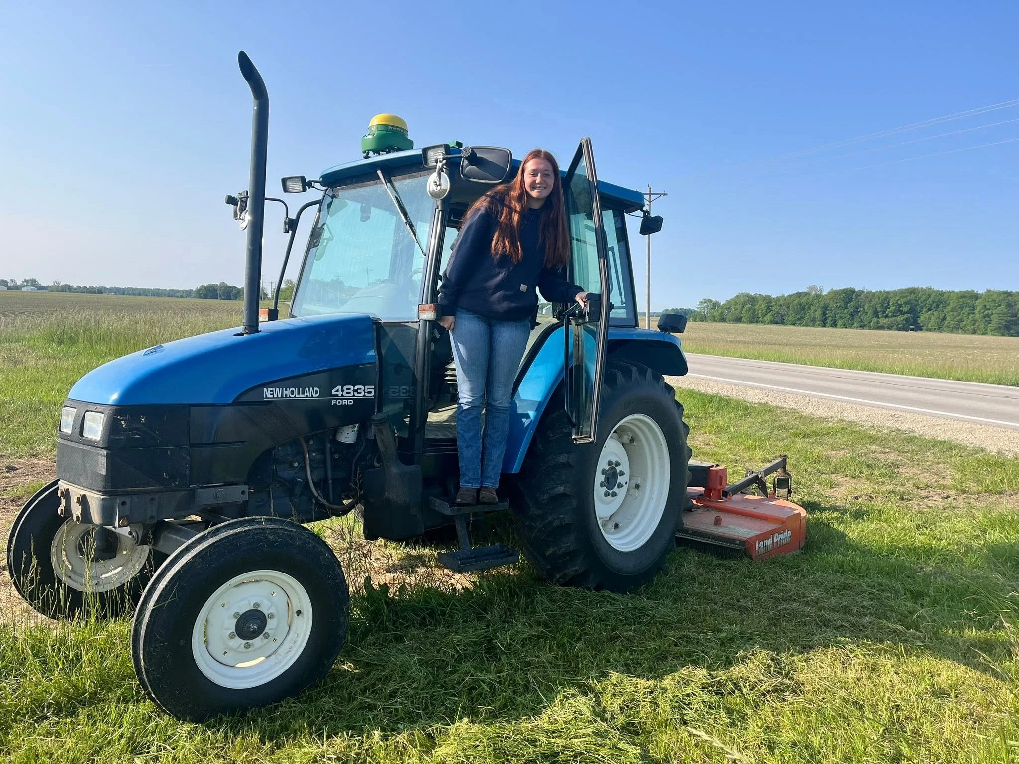 Gretchen mowing.jpg