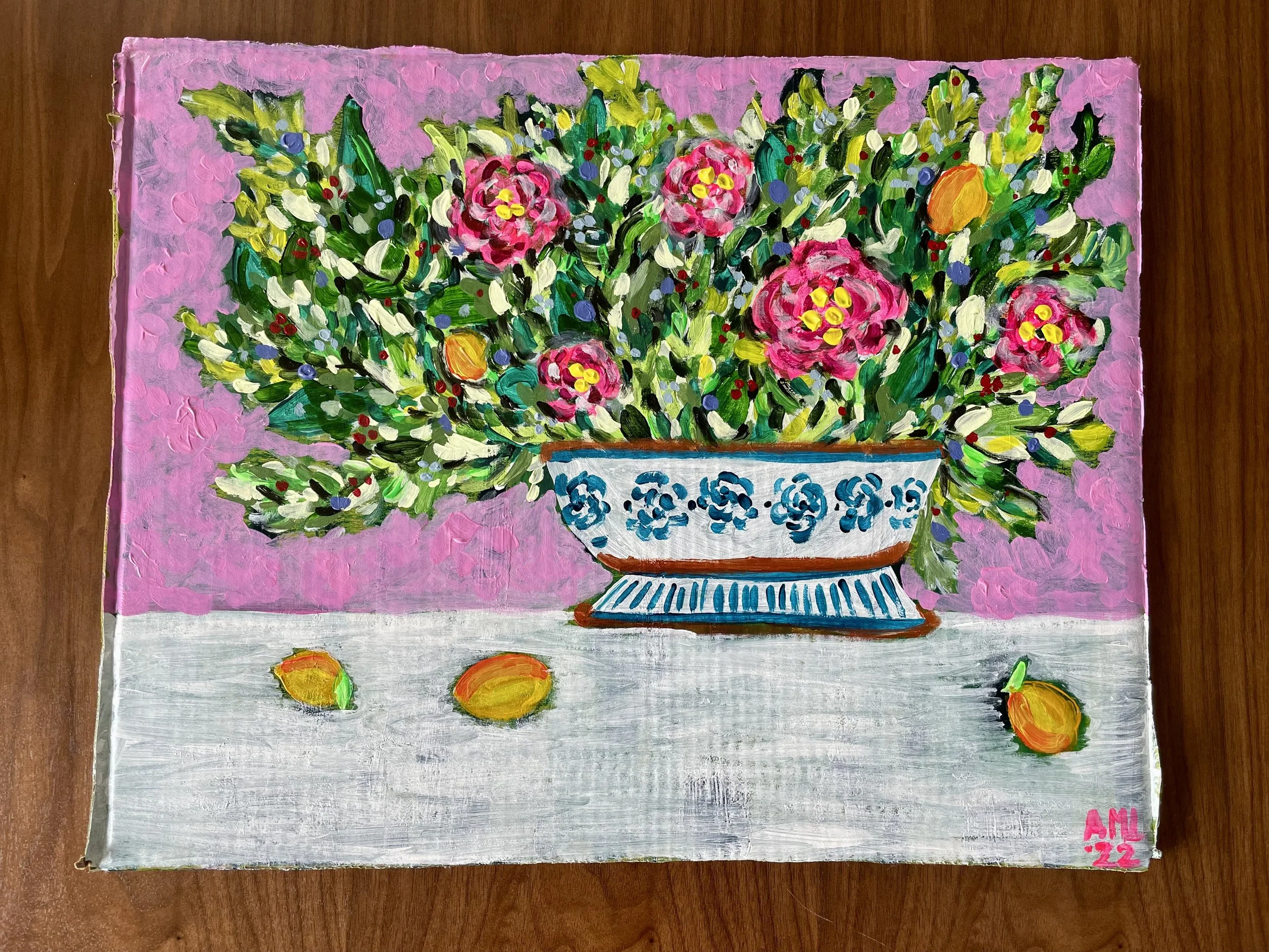 Still life with oranges in a blue and white vase on a pink background painting.