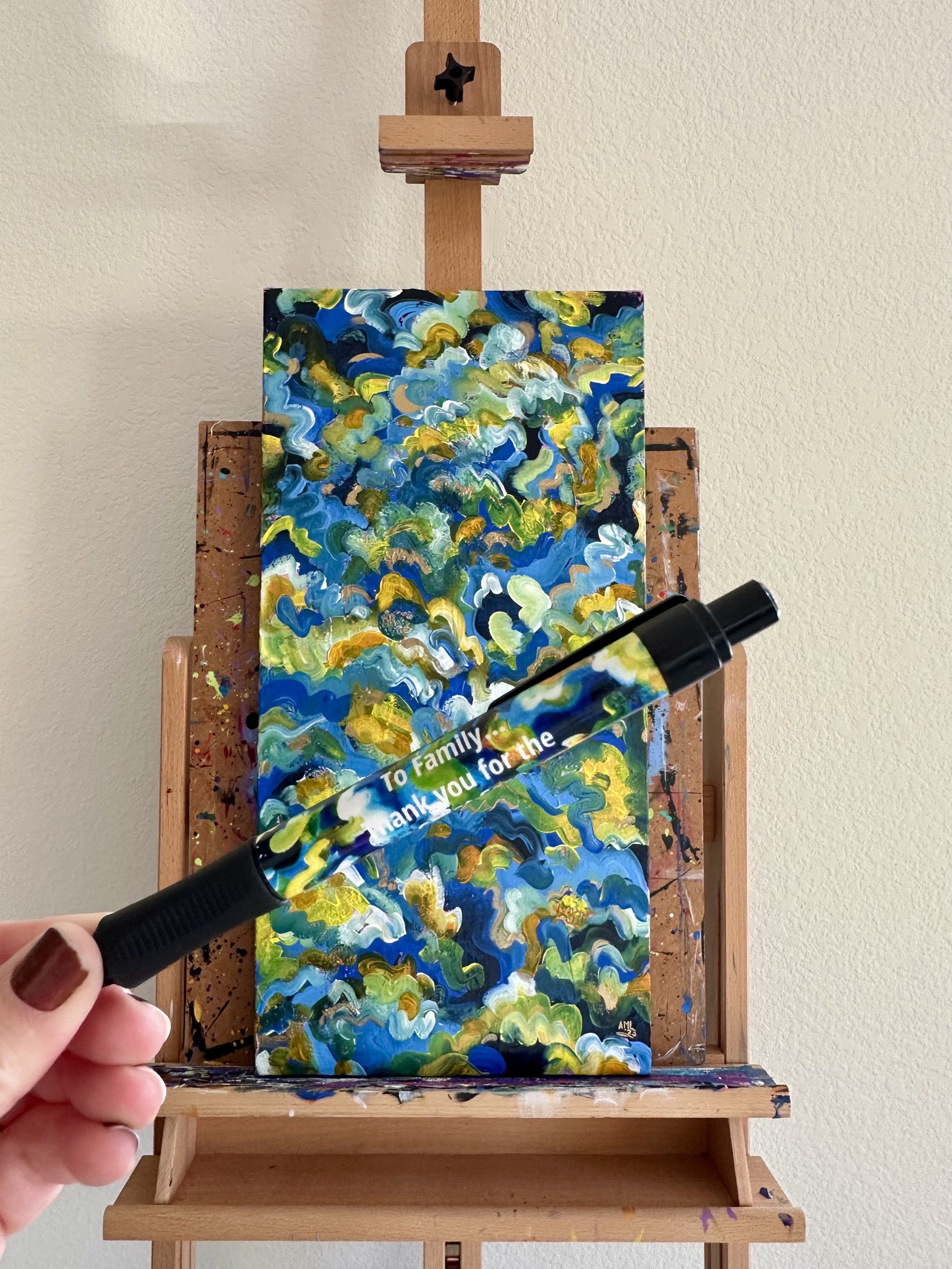 Blue and yellow swirl abstract painting.