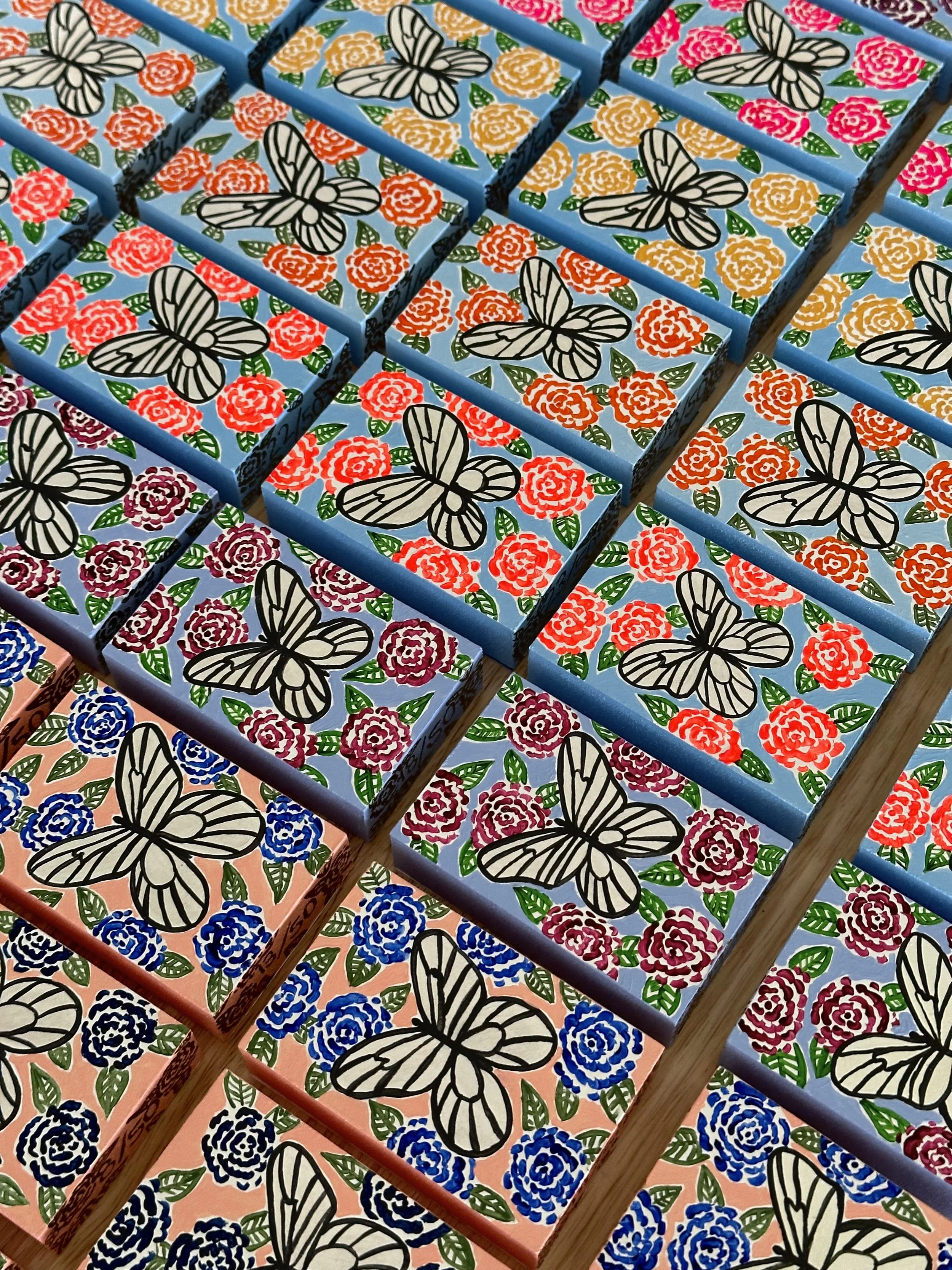 Multi color flowers and butterflies.