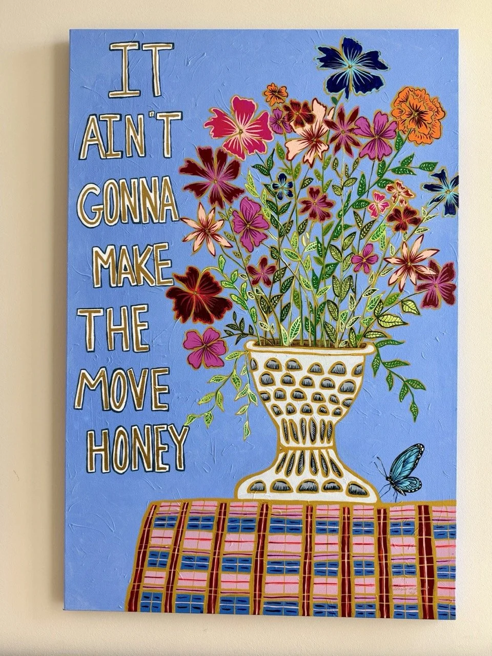 Bright, floral, still life painting with a humorous saying about military life by Alexis Lyons.