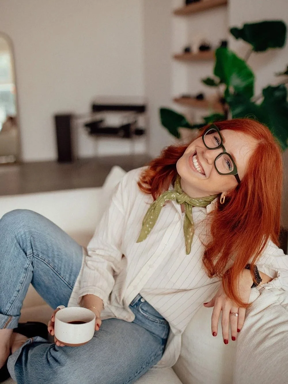 Haleigh Culverhouse, Enneagram coach for clinicians and practice owners, smiling in her studio
