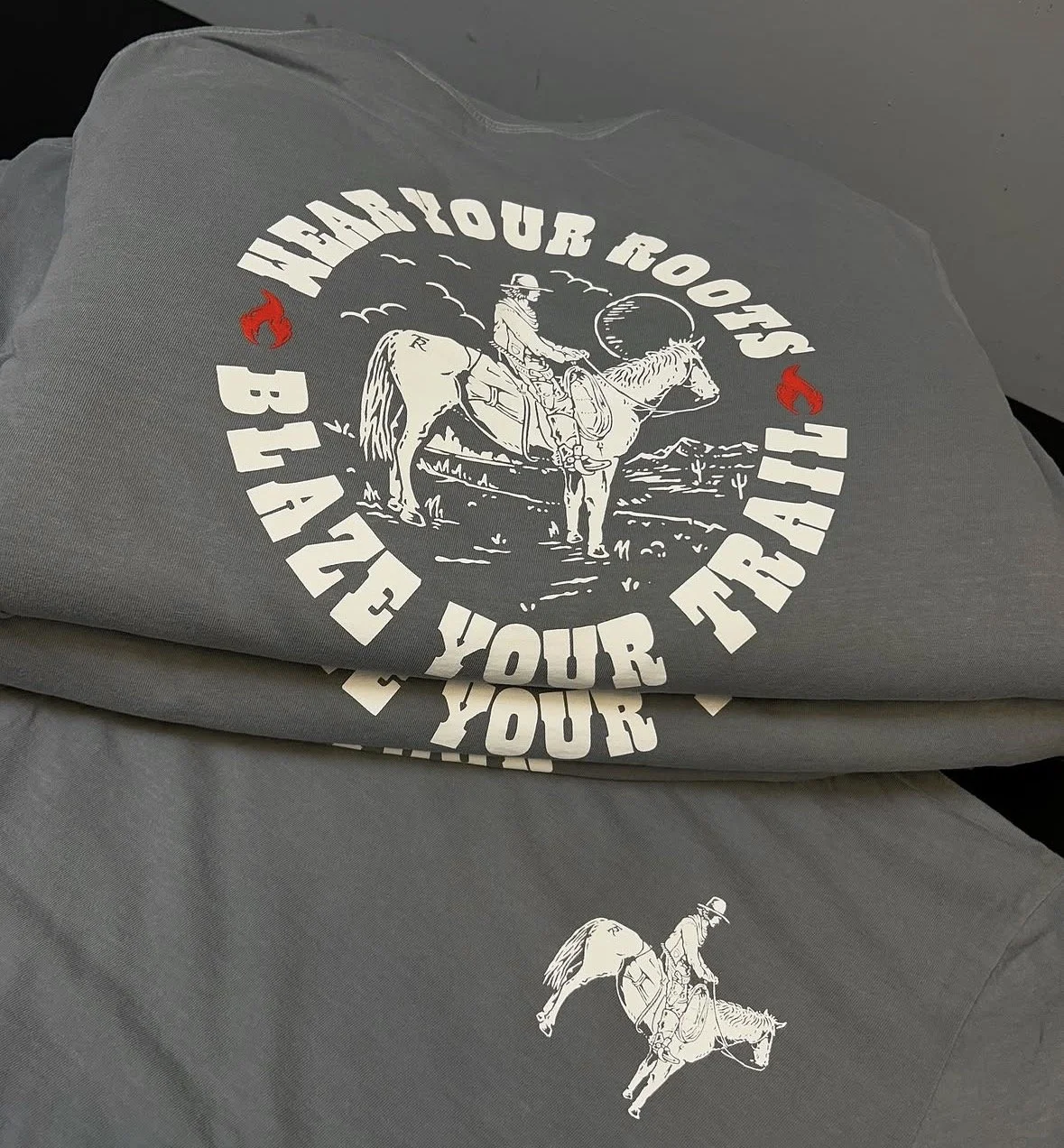 Grey comfort color shirts for a local brand called Texas Roots Outfitters