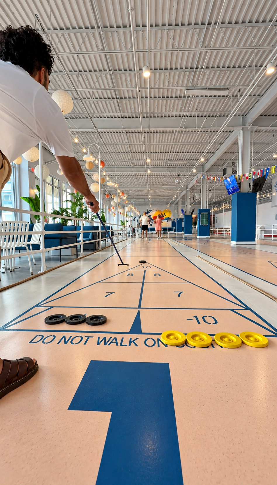 Friends playing shuffleboard