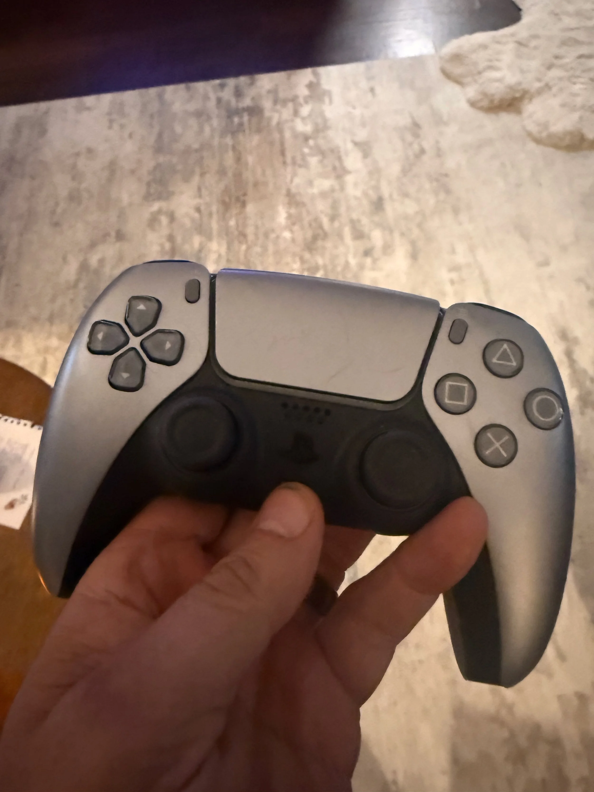 use ps5 controller. hit buttom above the thumb in this picture.