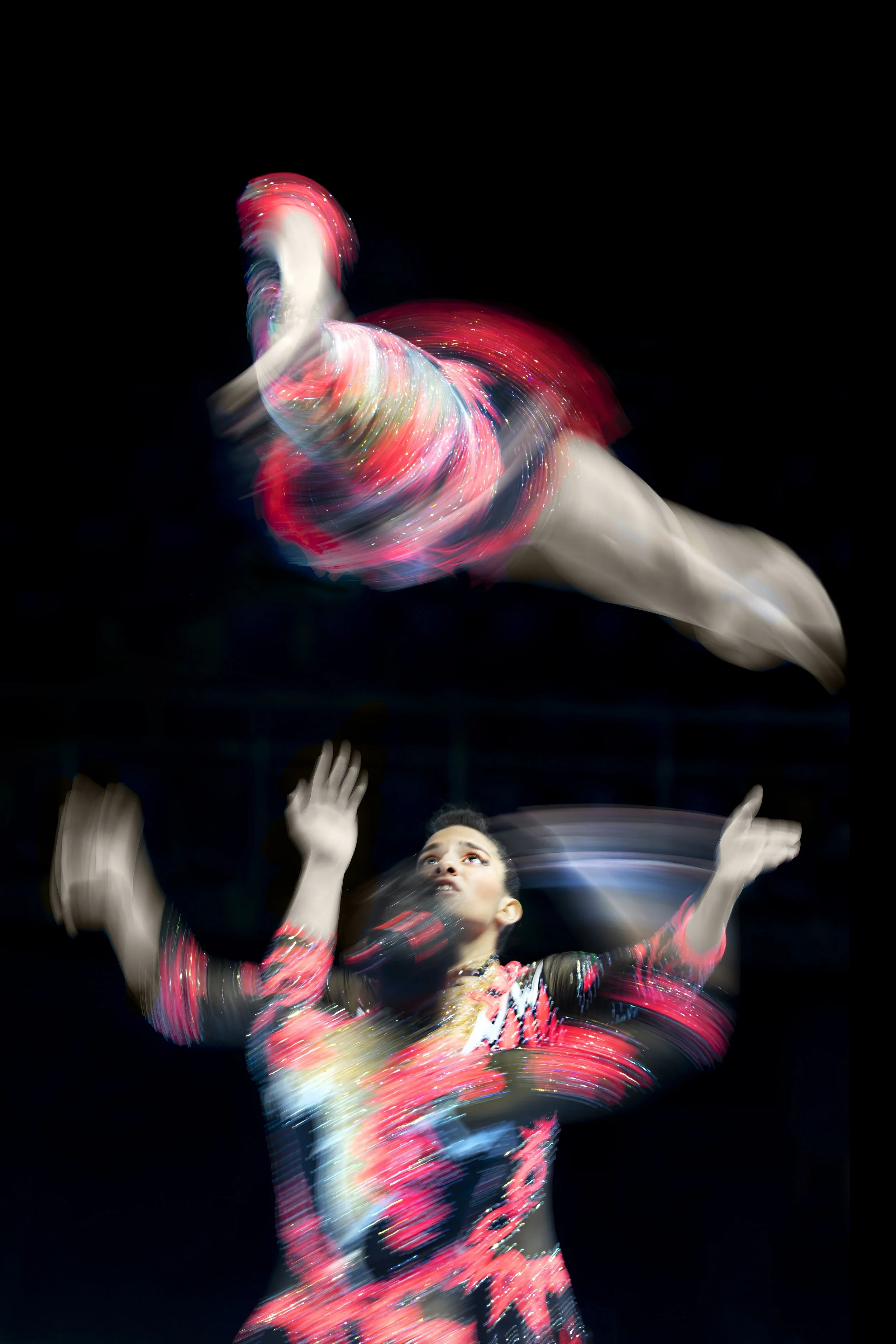 Title: We will catch you. 
A long exposure photograph of the Portugese female acro gymnastics team. 
World Championships Acro Gymnastics 2018, Antwerp (Belgium)
