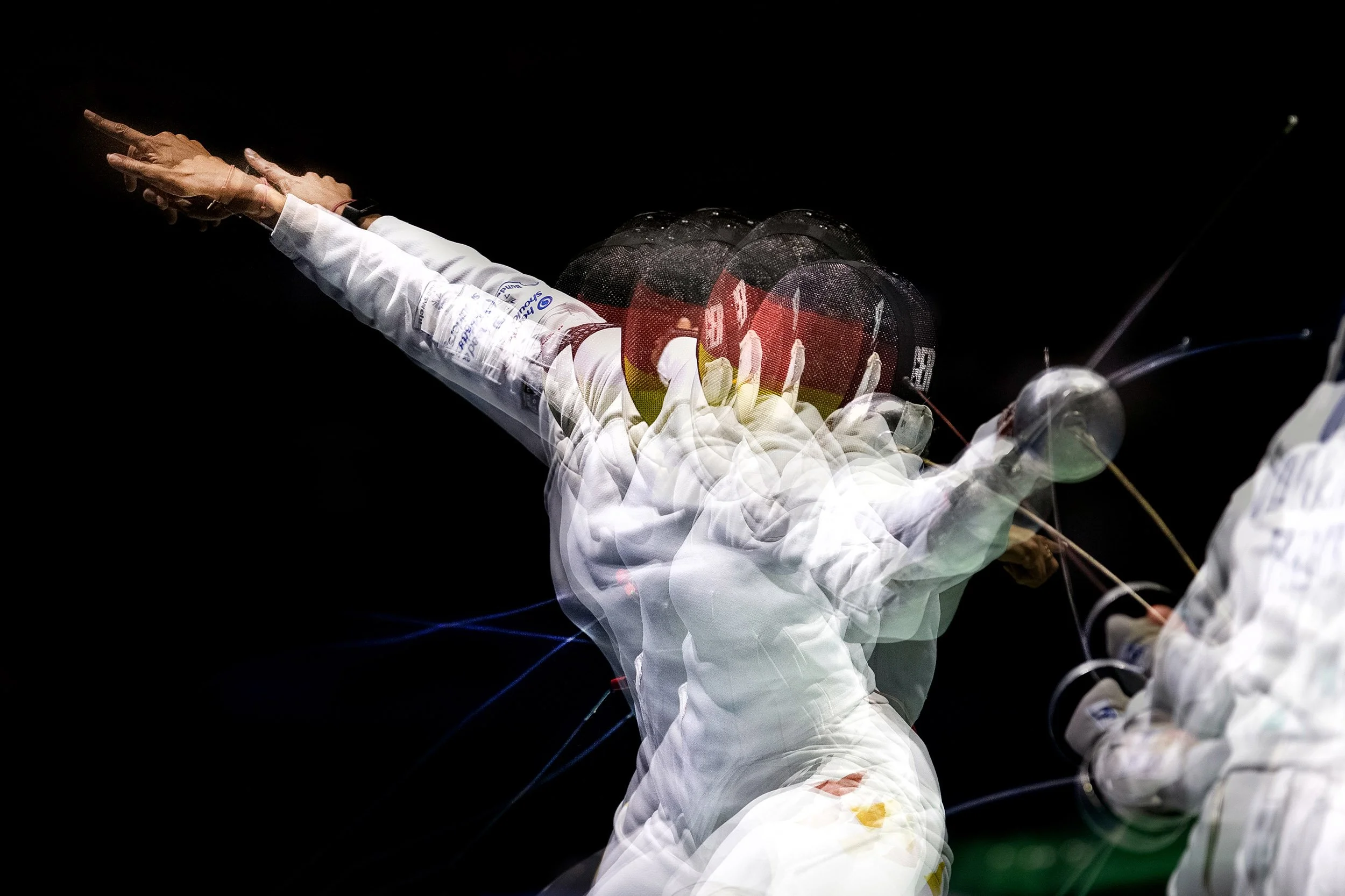 Title: The Attaque 
Multiple exposure photograph of a fencer 
European Fencing Championships 2019, Düsseldorf (Germany)