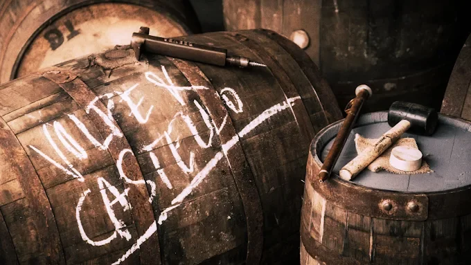 Whisky Cask with Volpe & Castello branded on the side in chalk.