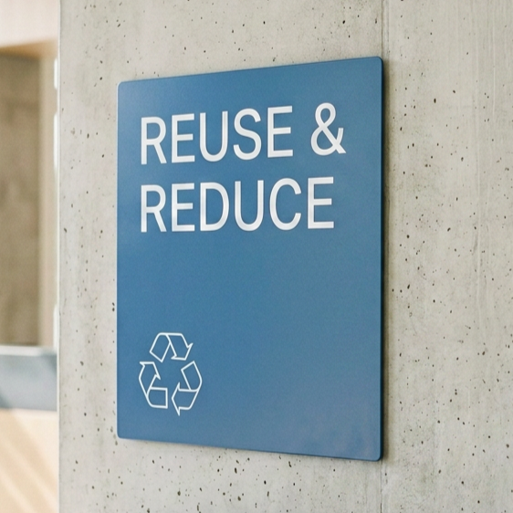 Reuse and reduce sign with recycling symbol promoting medical equipment sustainability