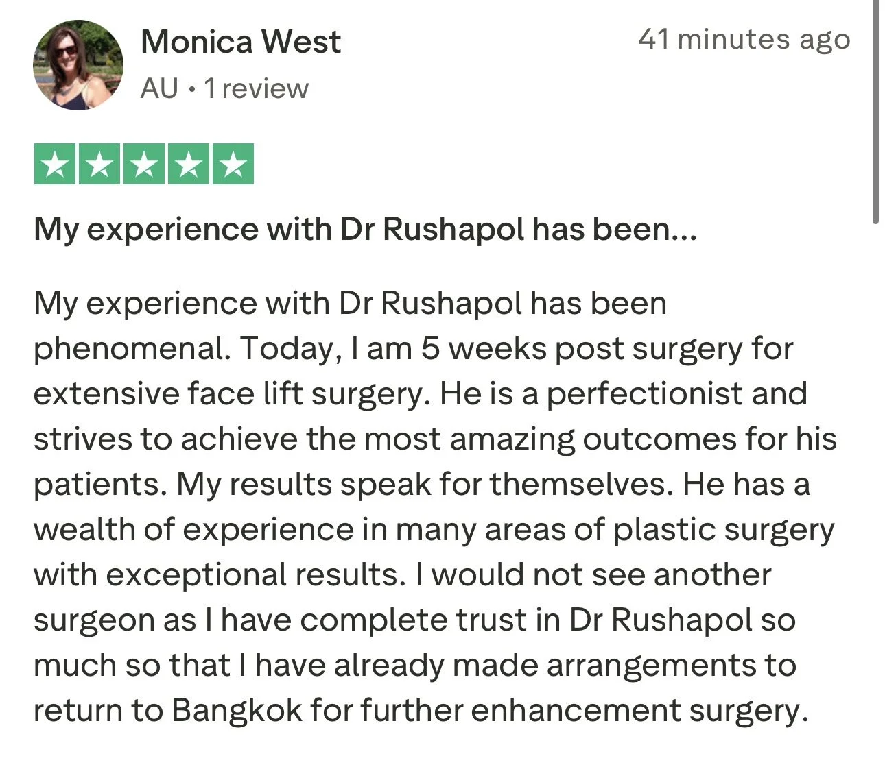 Screenshot of a Google review for Dr. Rushapol, expressing positive experiences with plastic surgery, specifically face lift surgery.