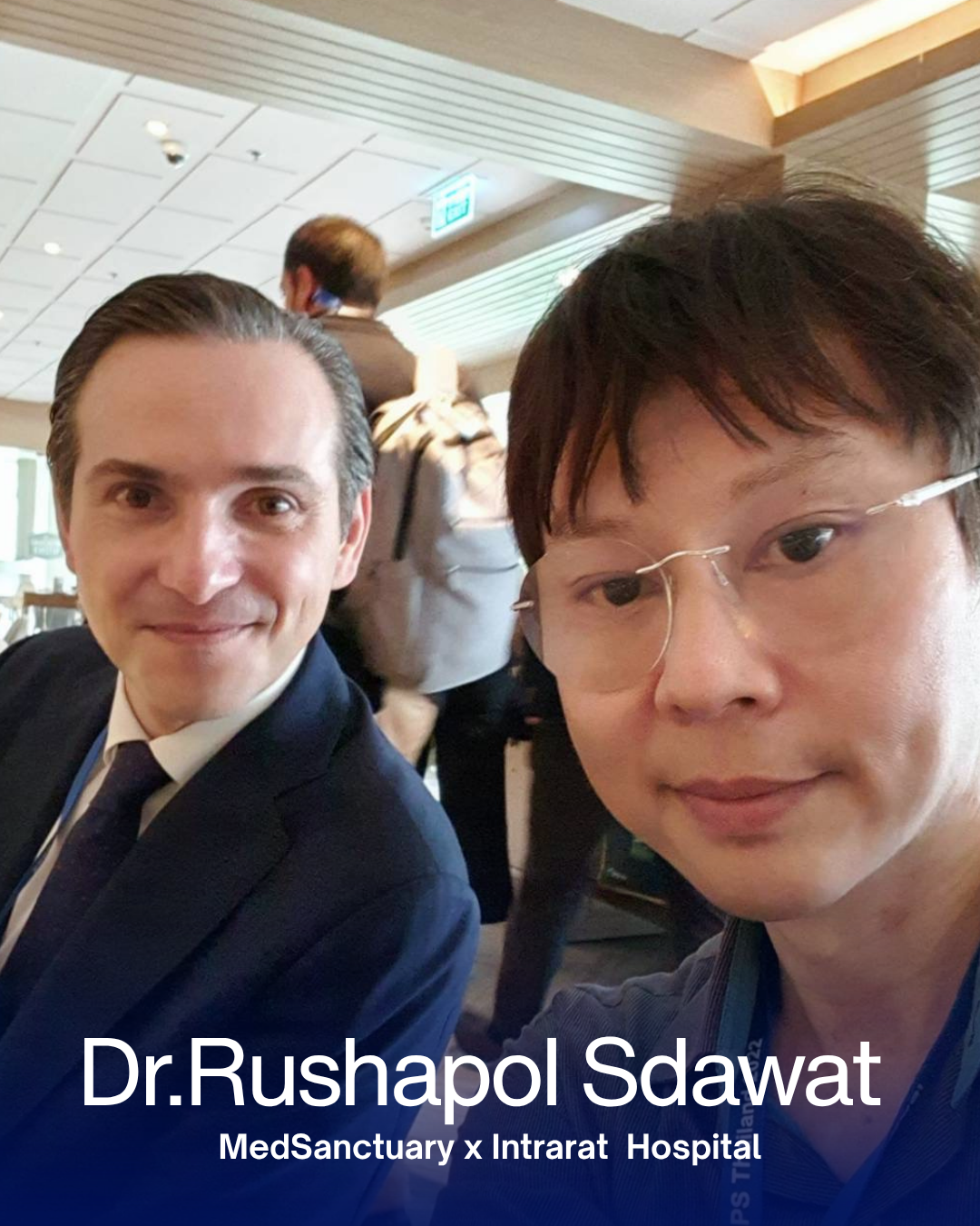 Selfie of two men inside a hospital, with text identifying Dr. Rushapol Sdawat and MedSanctuary x Intrarat Hospital.