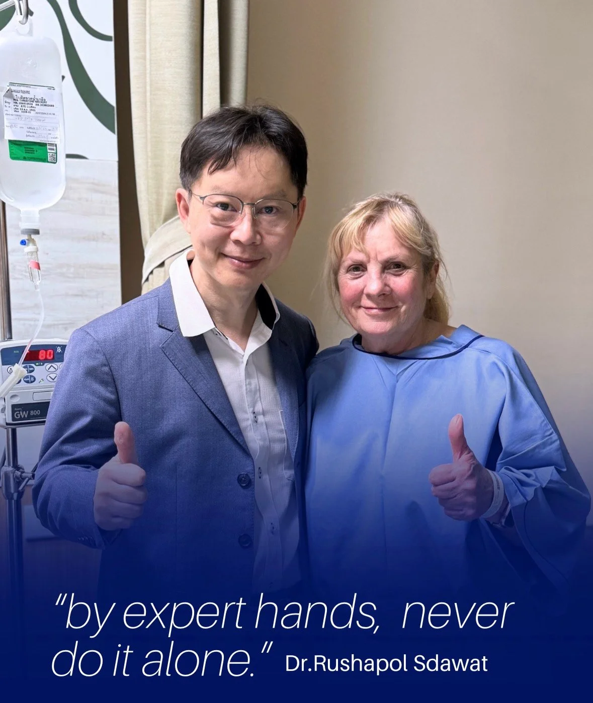Doctor and a smiling patient giving a thumbs-up in a hospital room