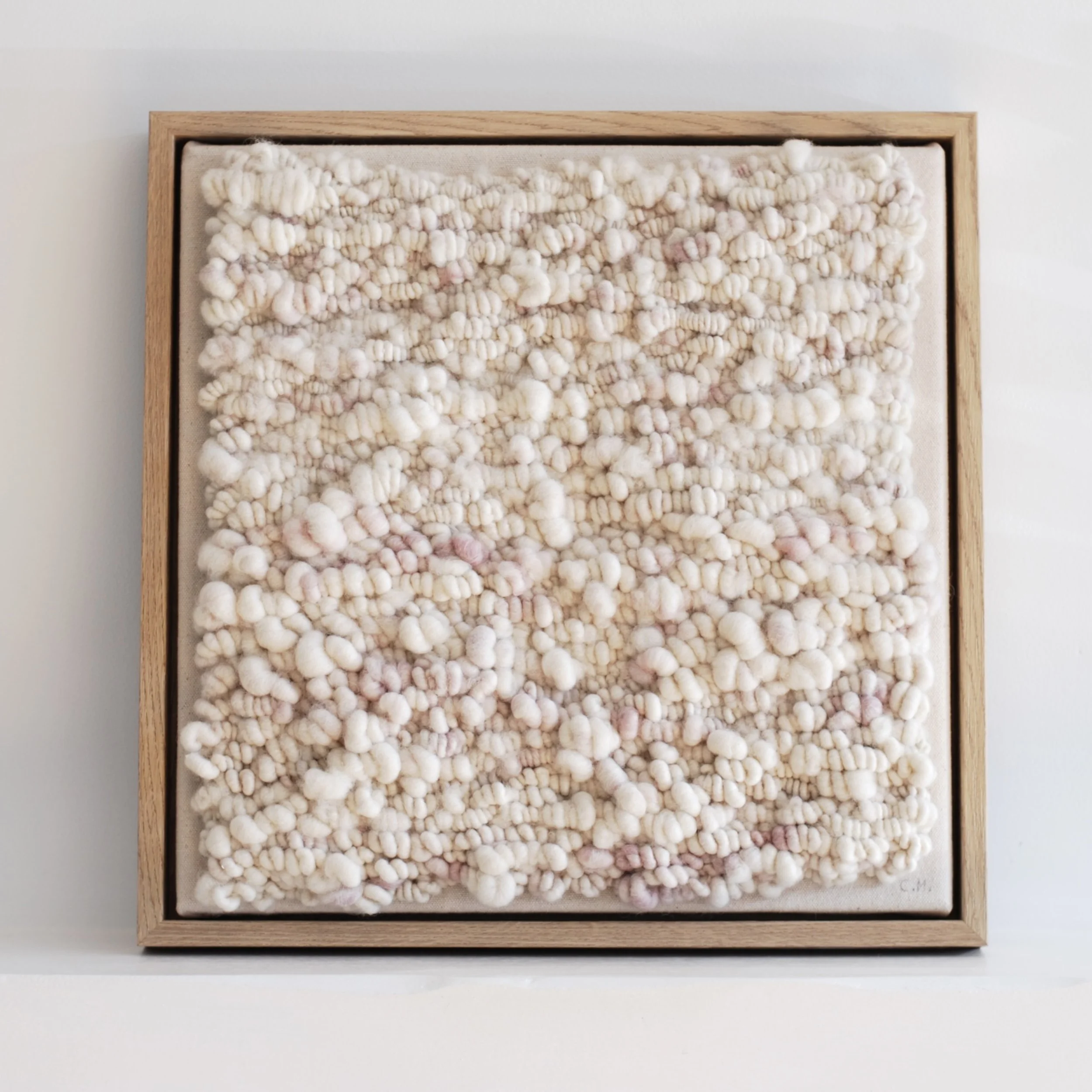 Abstract woven wall art by the artist Carol Matassa