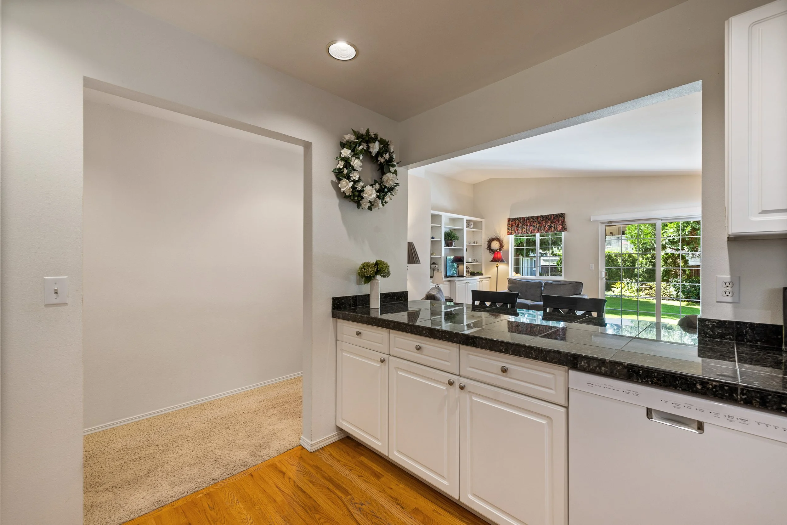 Never feel cut off while on kitchen duty as this passthrough allows you to be connected to the den.