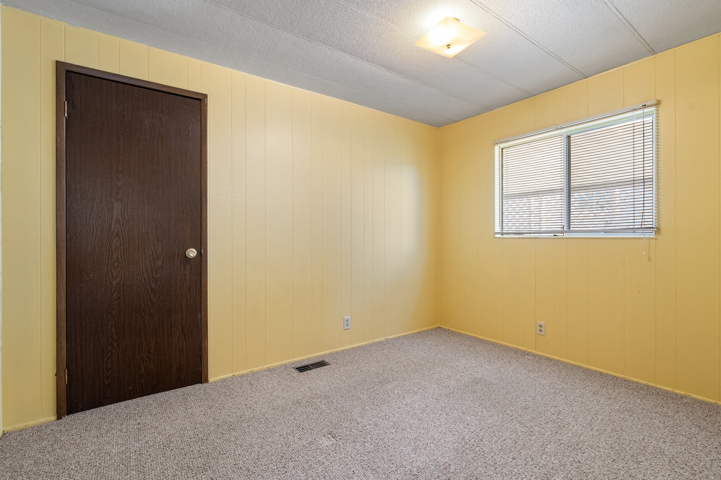 Bedroom #2 is decent size and offers a large closet. 