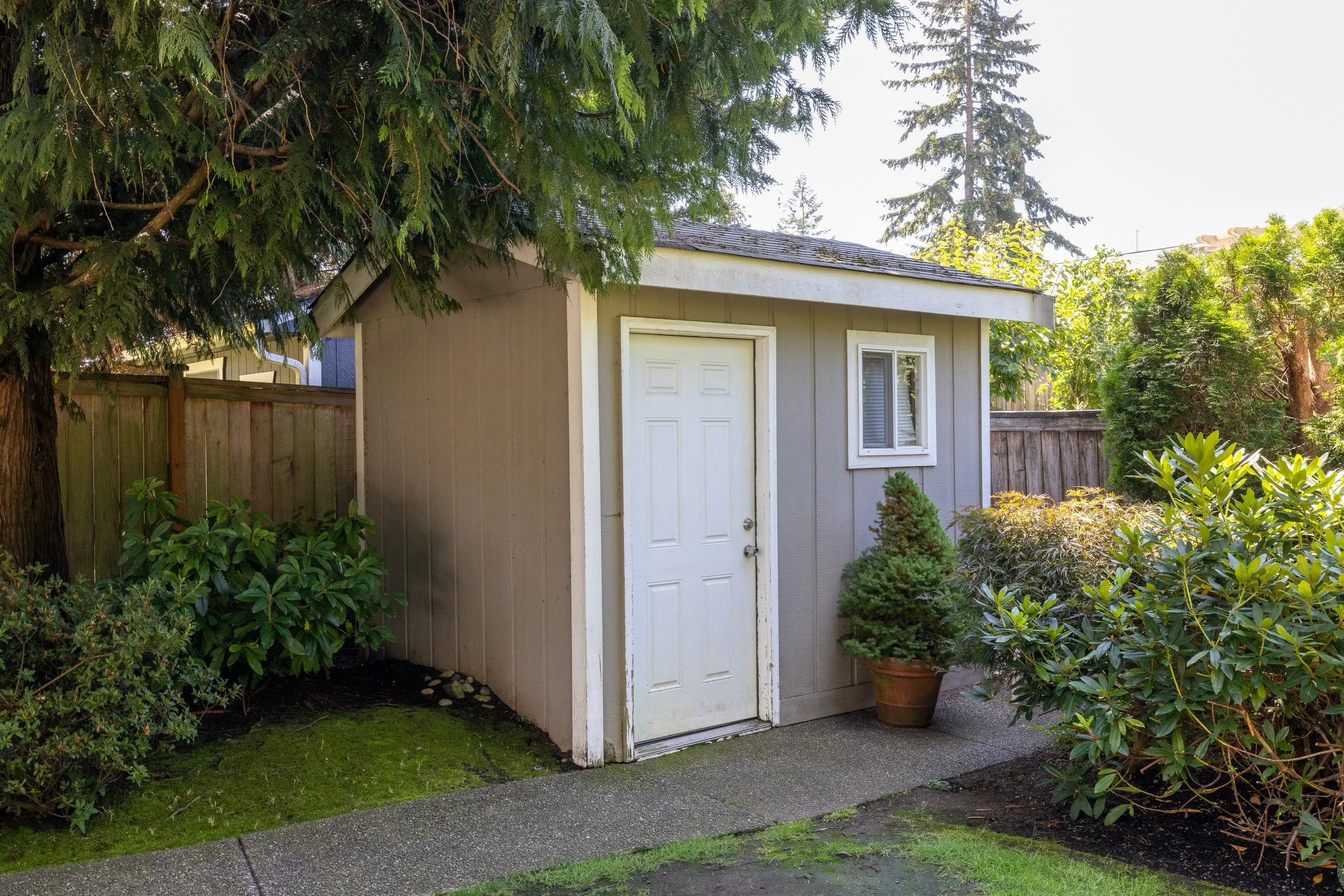 A garden shed makes room in the garage for all of your toys!