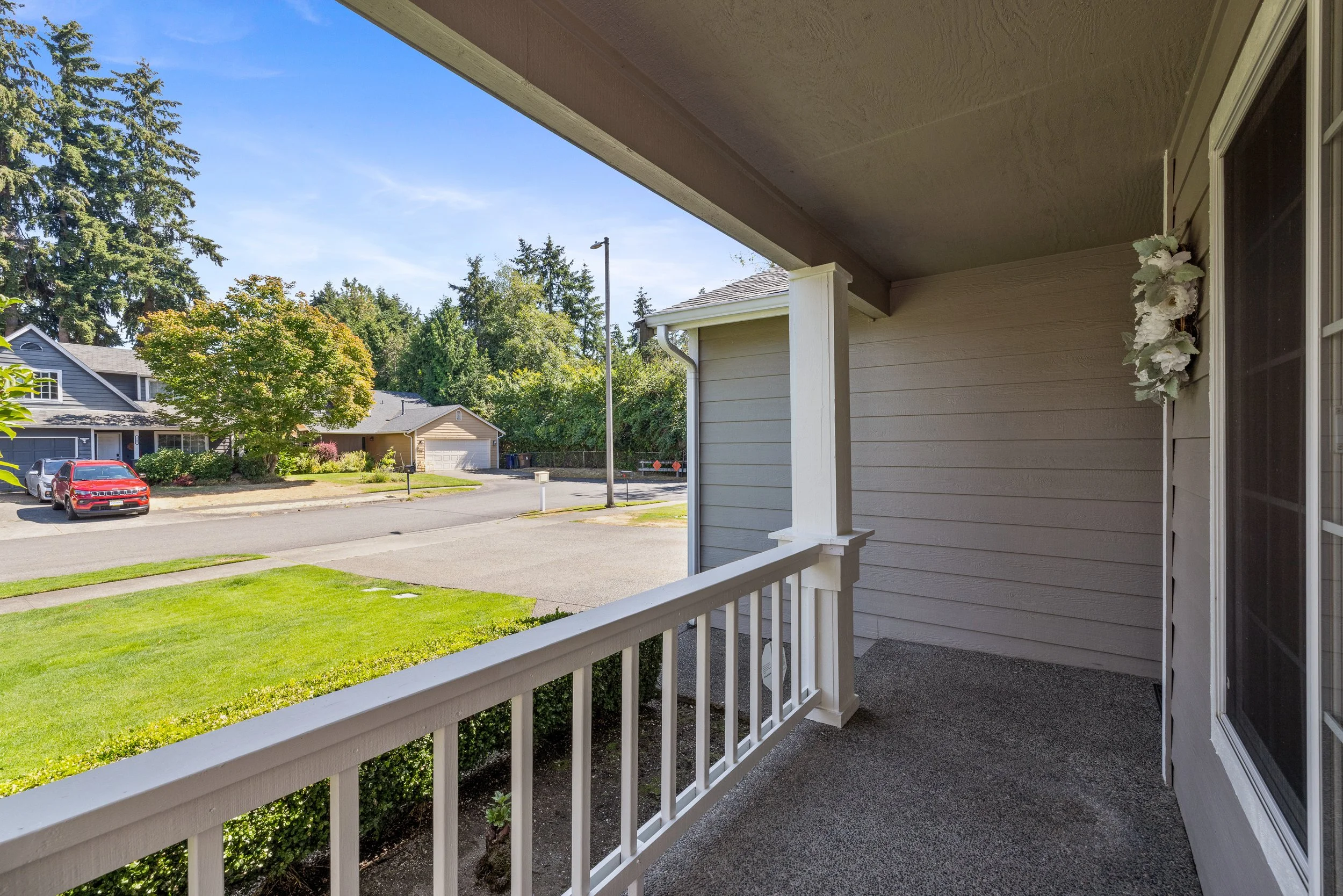 Enjoy the morning sun on this covered front porch.