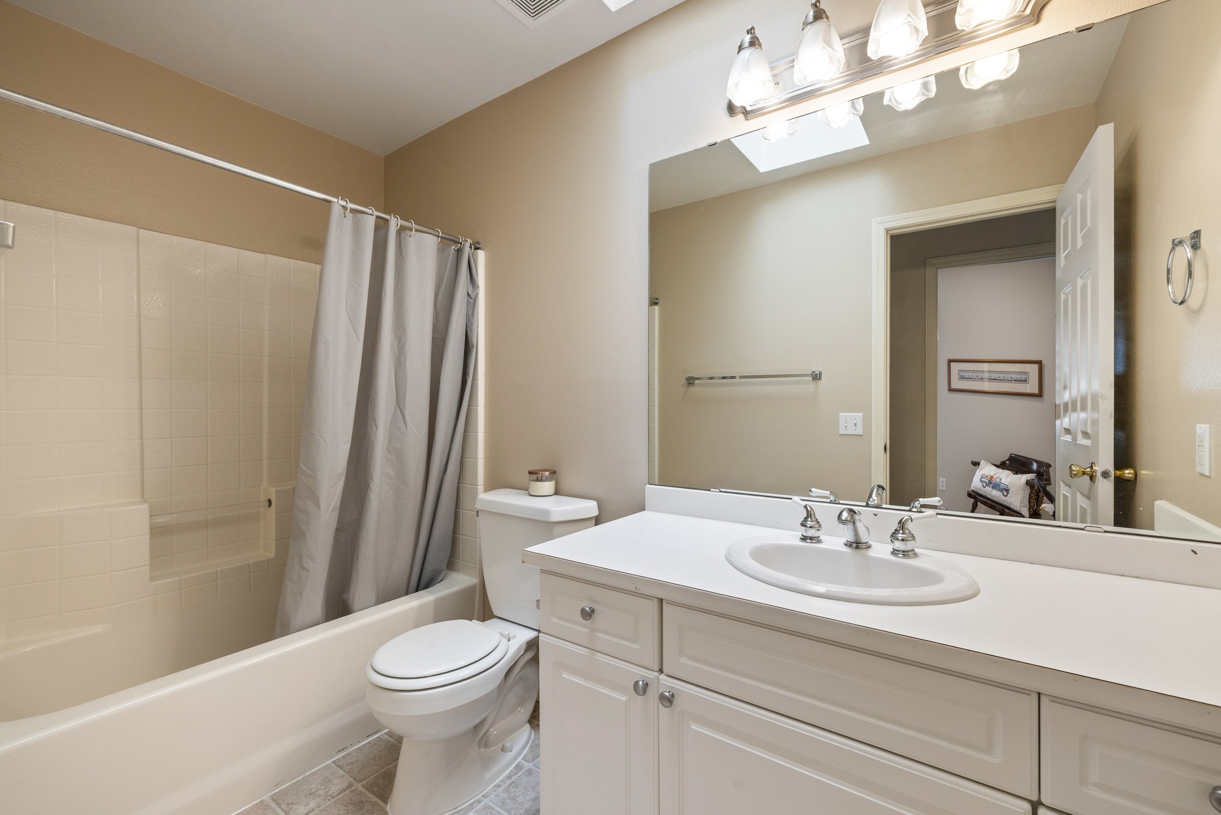 Main full bathroom is conveniently located in near the 2 additional bedrooms.