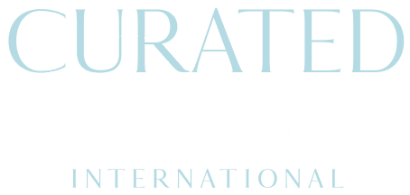 Curated Excellence International logo