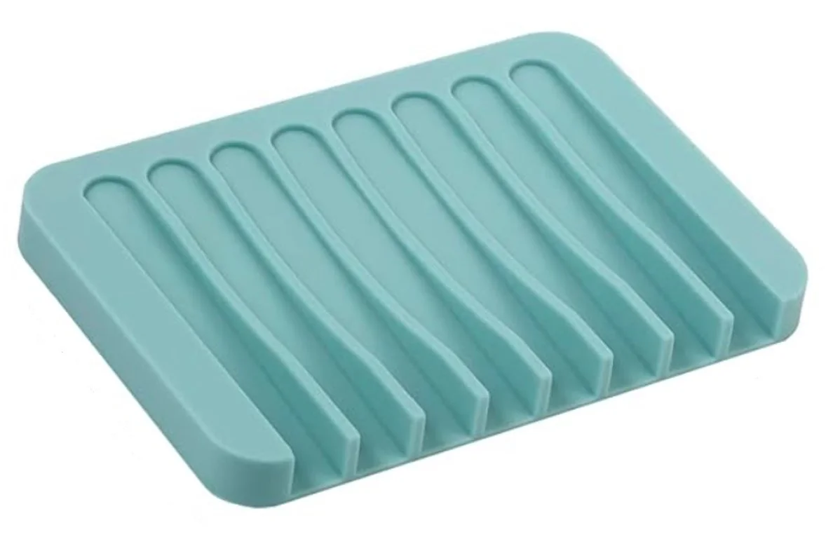A soap dish with raised drainage slats designed to help handmade soap drain, dry, and last longer.