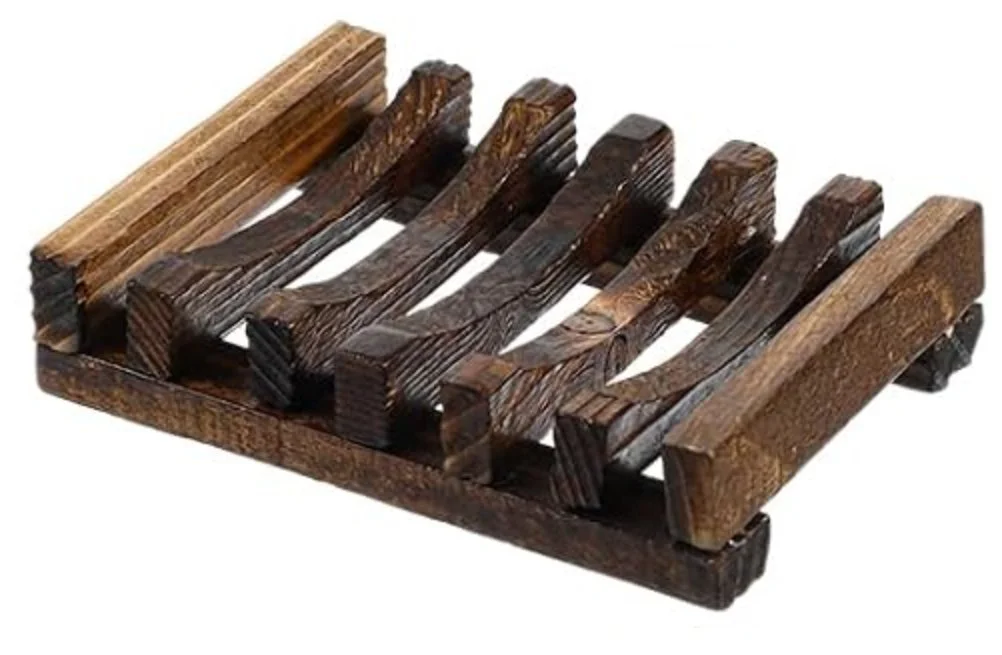 Wooden soap dish with an open slatted design to help handcrafted soap drain, dry, and last longer.