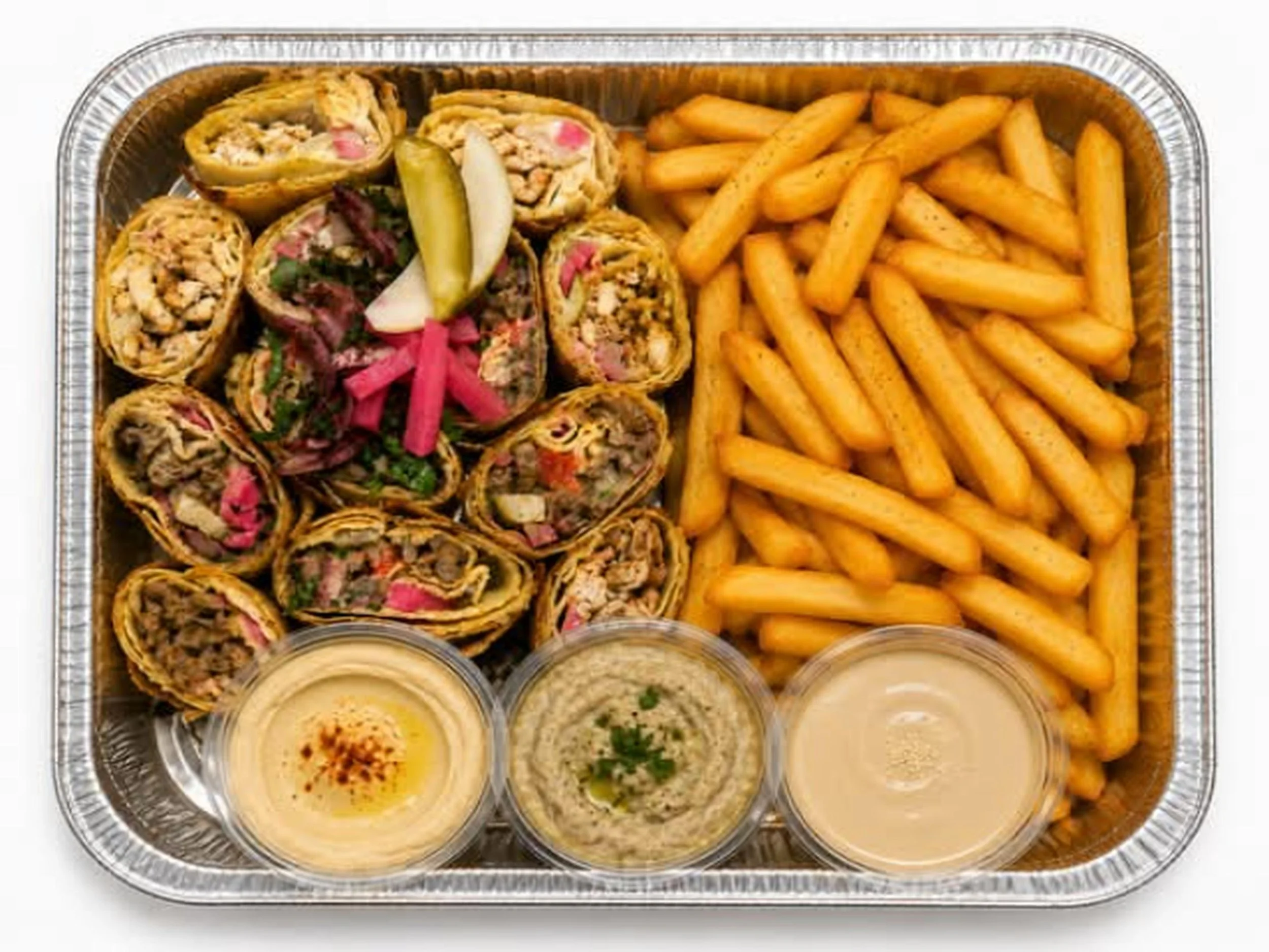 A takeout tray with wraps, French fries, and dipping sauces.