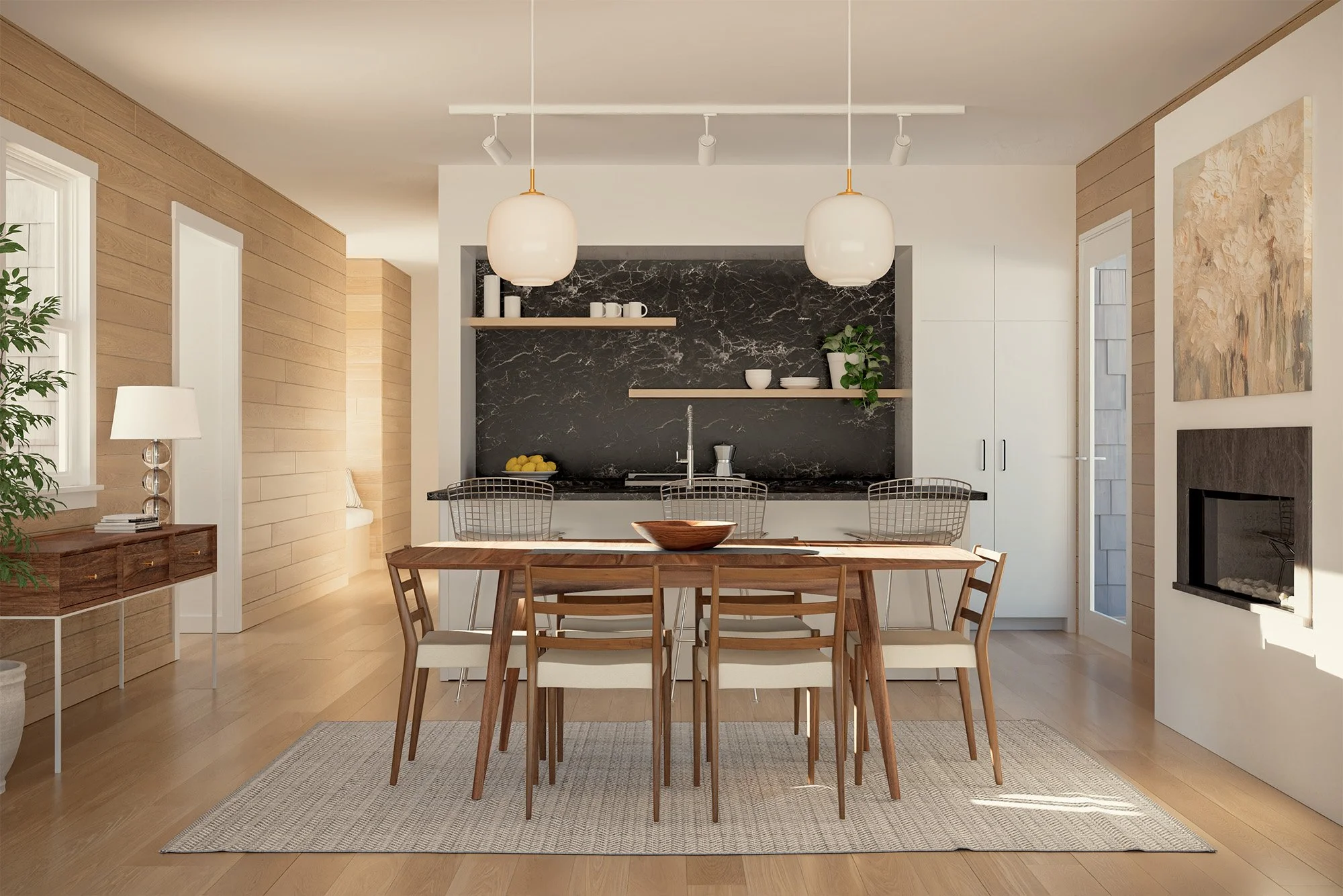 Modern kitchen with light wood floors, beige walls, black marble backsplash, and hanging pendant lights over a dining table with wooden chairs.