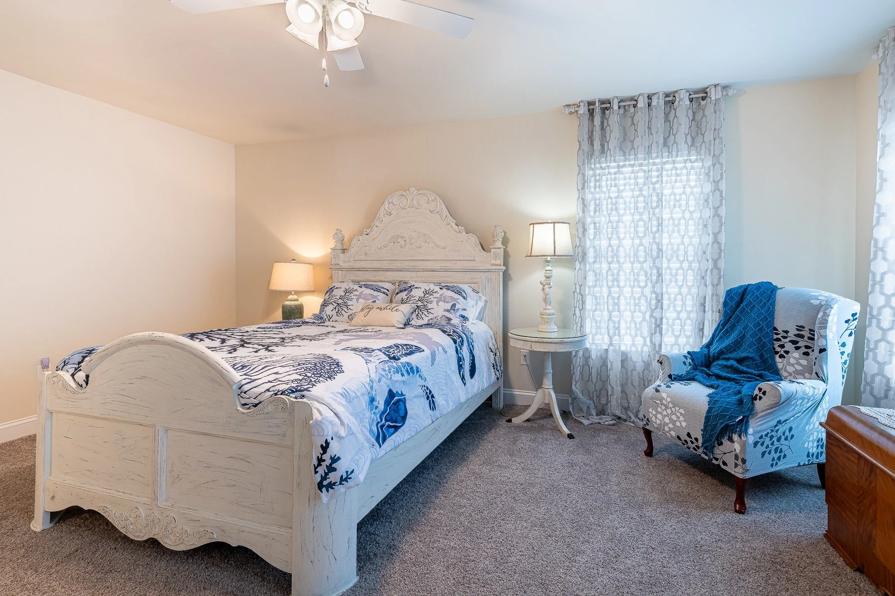 Bright upstairs bedroom with sitting area at 28839 W Henry Place.