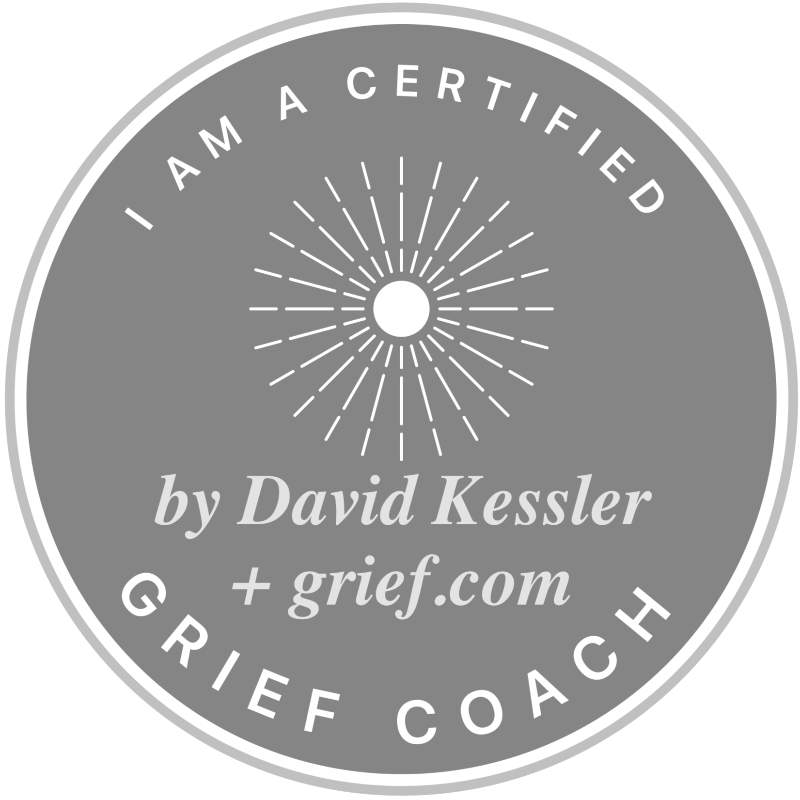 Gray circular seal with a radial sunburst pattern at the top center, with the text 'I AM A CERTIFIED' curving along the upper edge, and 'by David Kessler & grief.com' in the center. The bottom edge has the words 'GRIEF.EOAC' curved along the circle.
