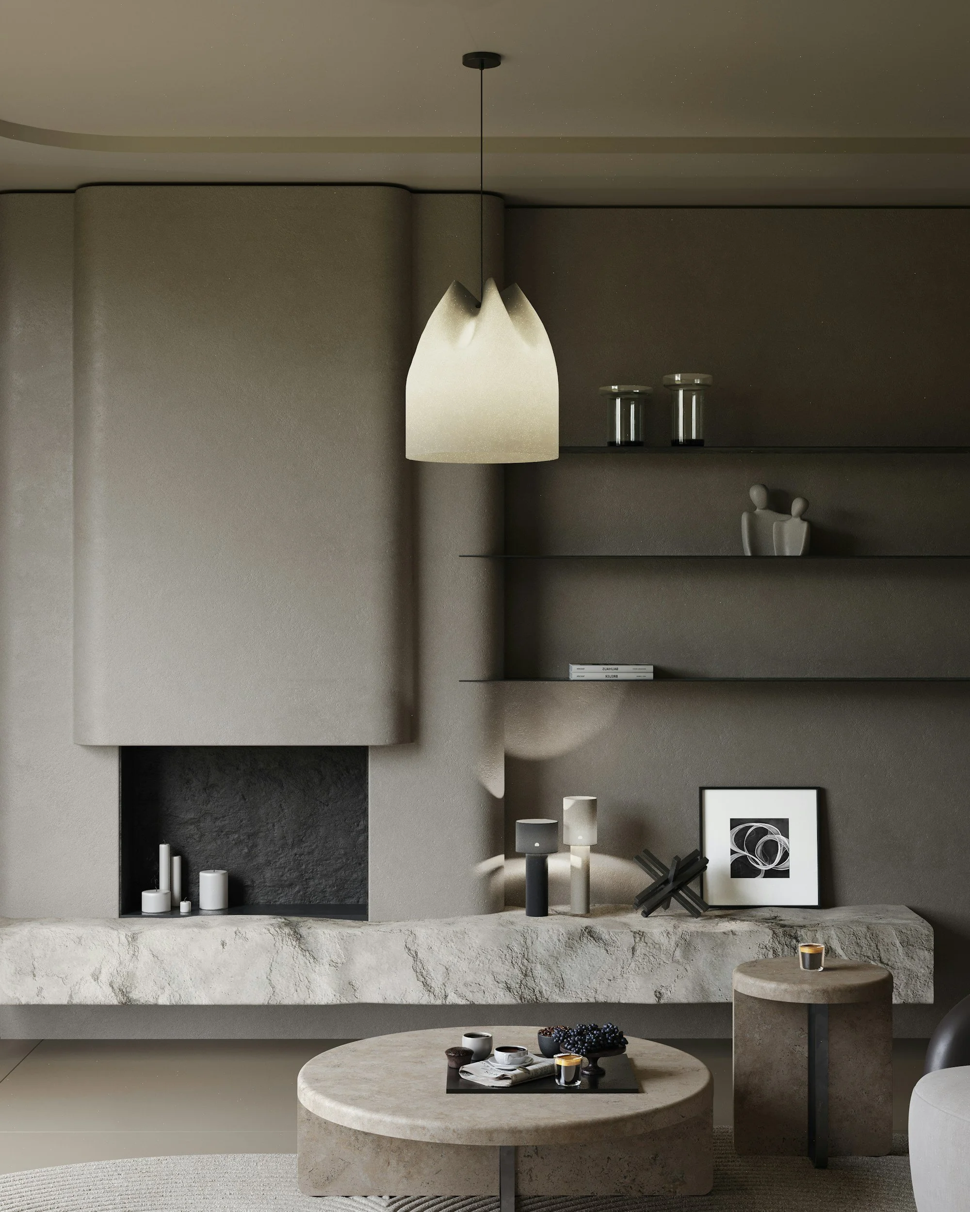 A modern minimalist living room decor featuring a beige concrete fireplace, a round marble coffee table with a black tray, cups, and bowls, candles, and decorative objects on shelves and wall, with neutral colors and simple art.