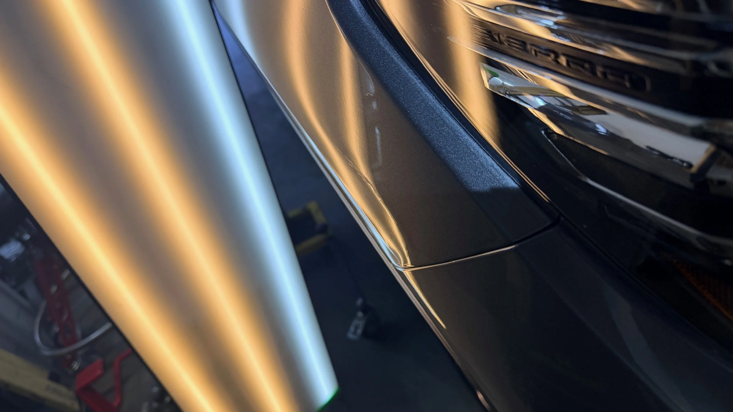 Exterior panel dent before professional PDR restoration