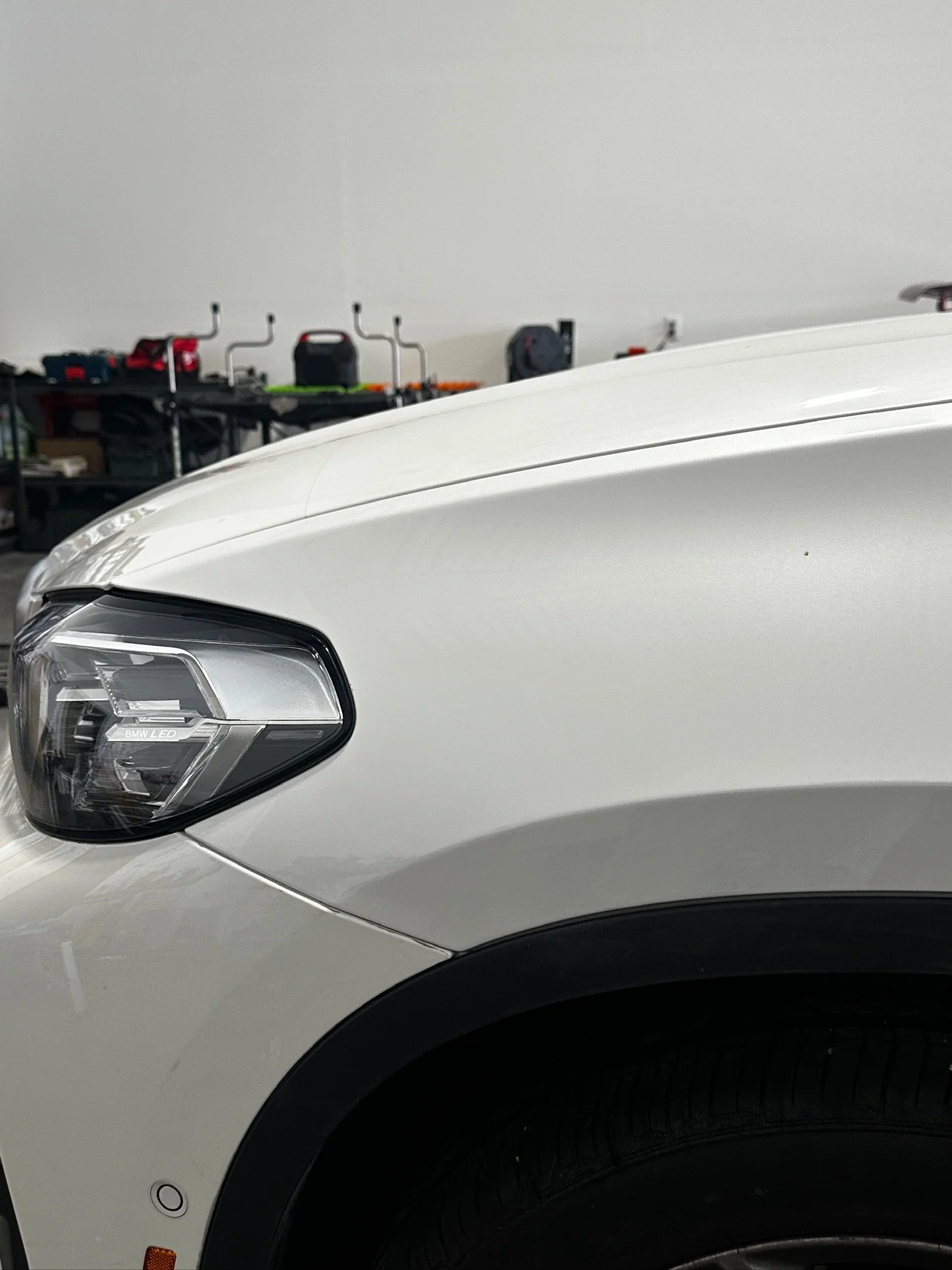 Completed fender crease repair by Arvada Dent Repair using paintless dent repair techniques and tools. 