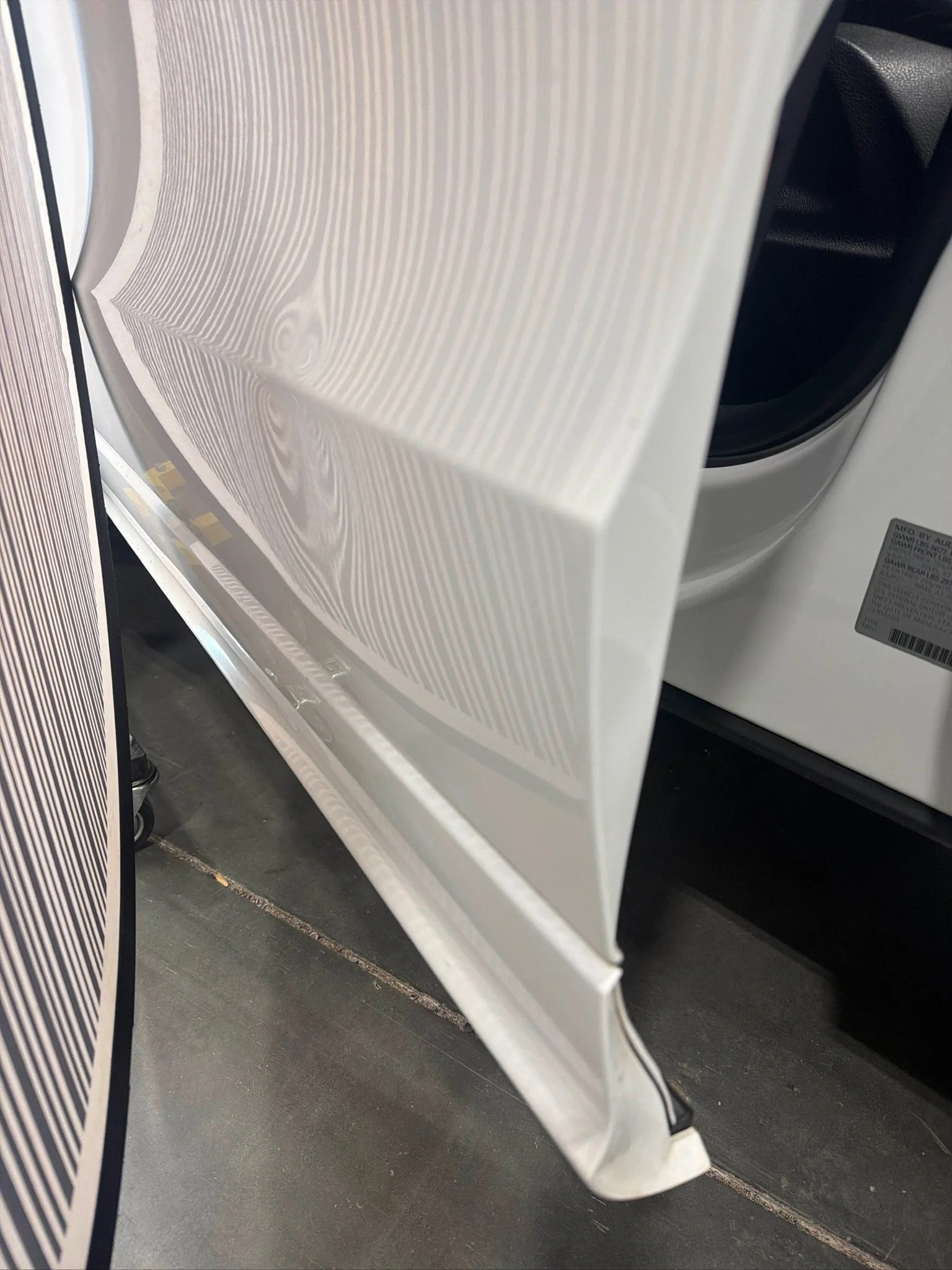 Restored body line after professional paintless crease repair