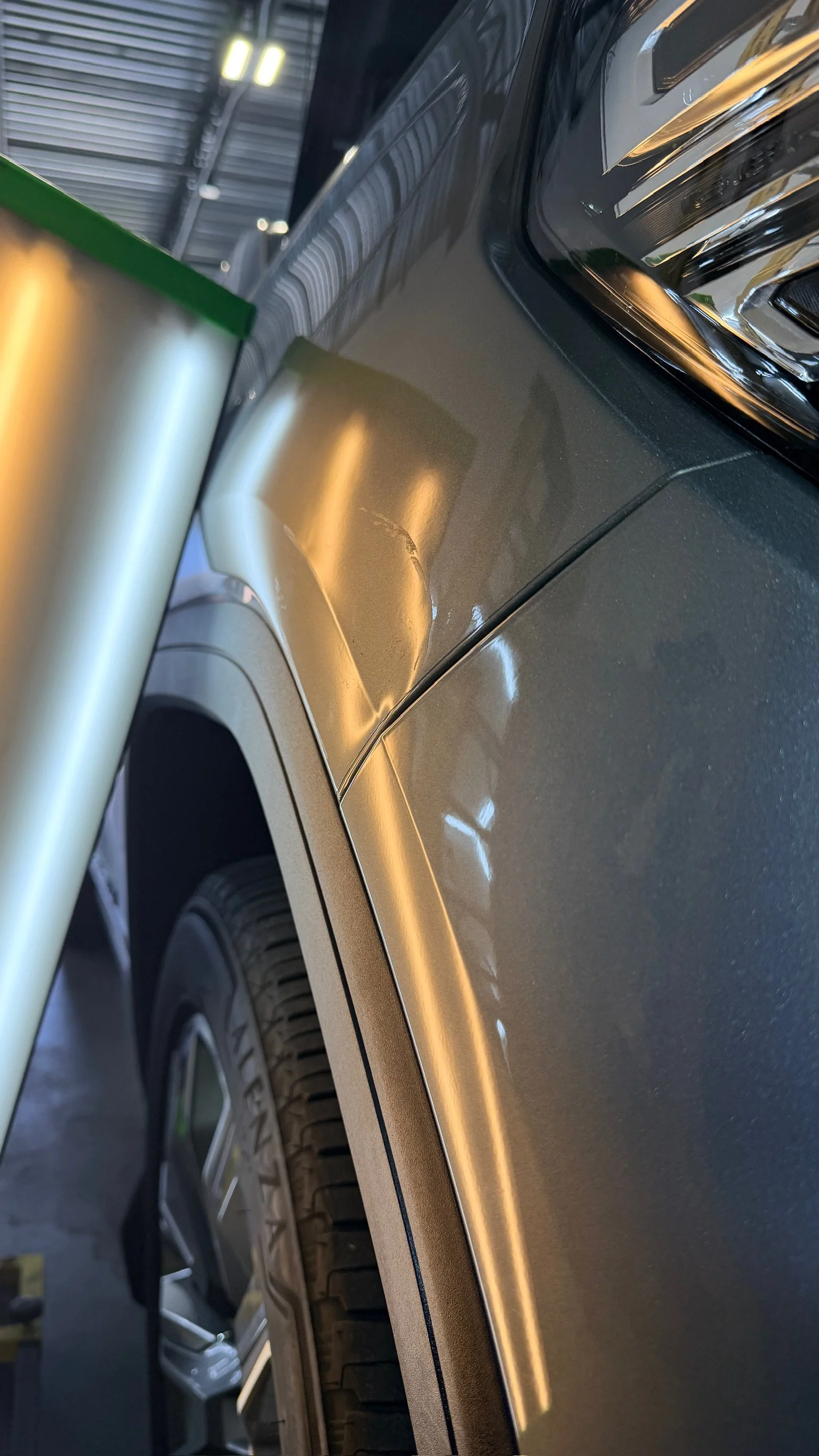 Exterior panel dent before professional PDR restoration