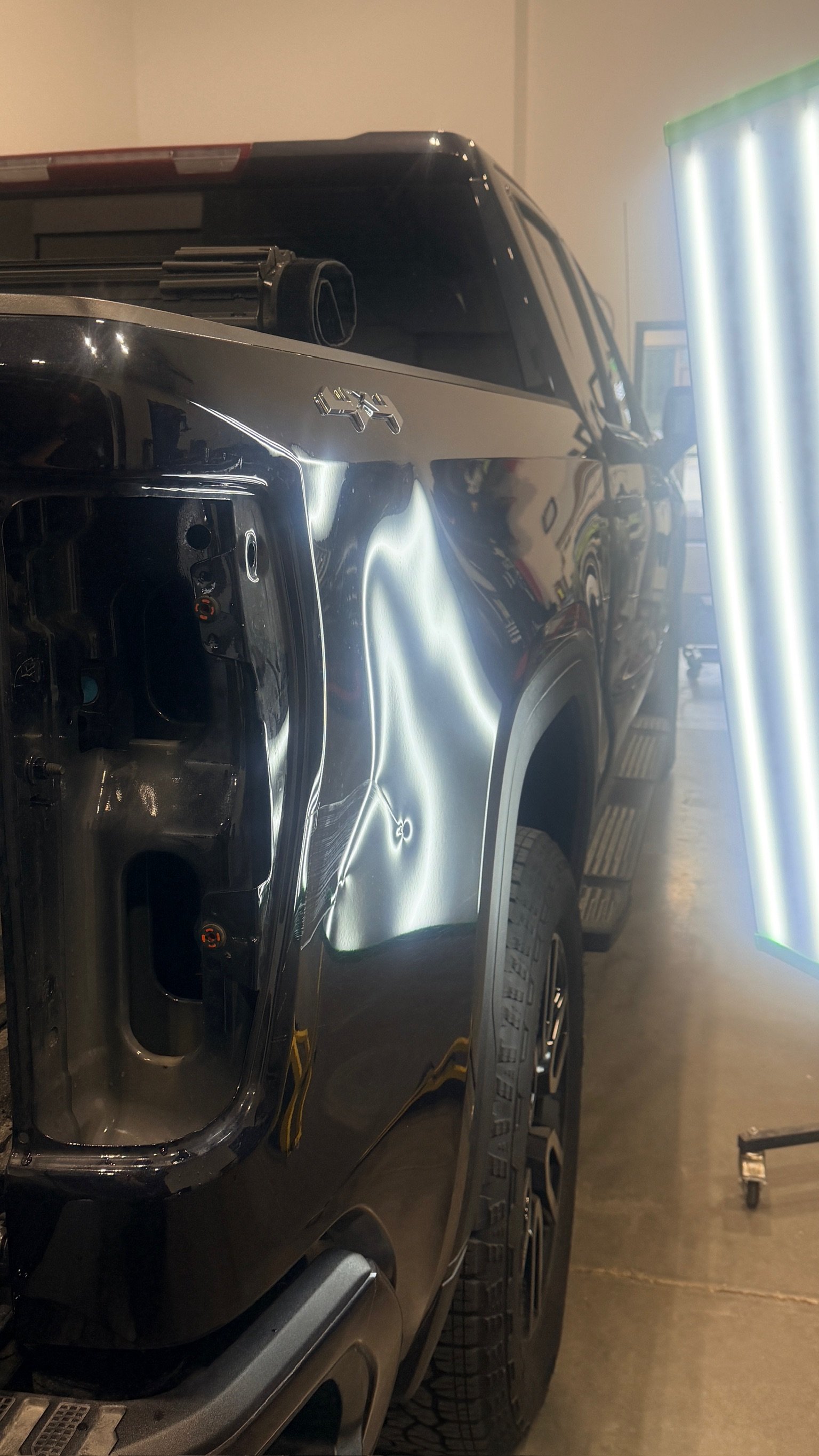 Rear quarter panel dent and crease before paintless dent repair