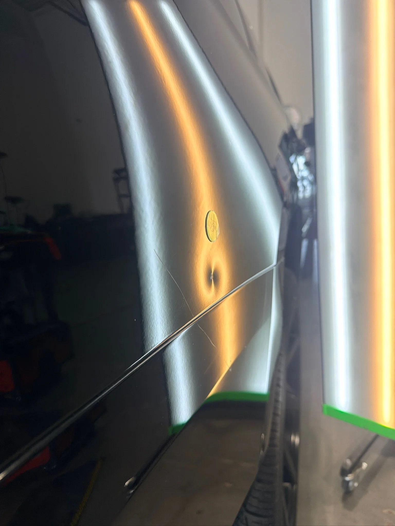 Minor exterior dent before professional paintless dent removal