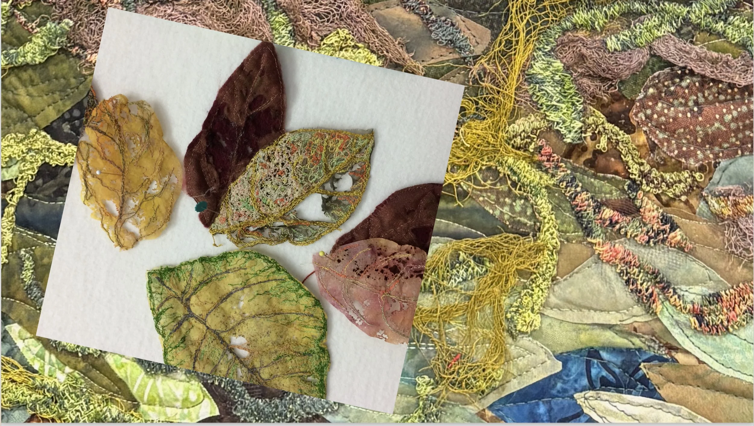 Close-up of embroidered and stitched leaf designs on fabric, with a larger collage of similarly designed fabric leaves in the background.