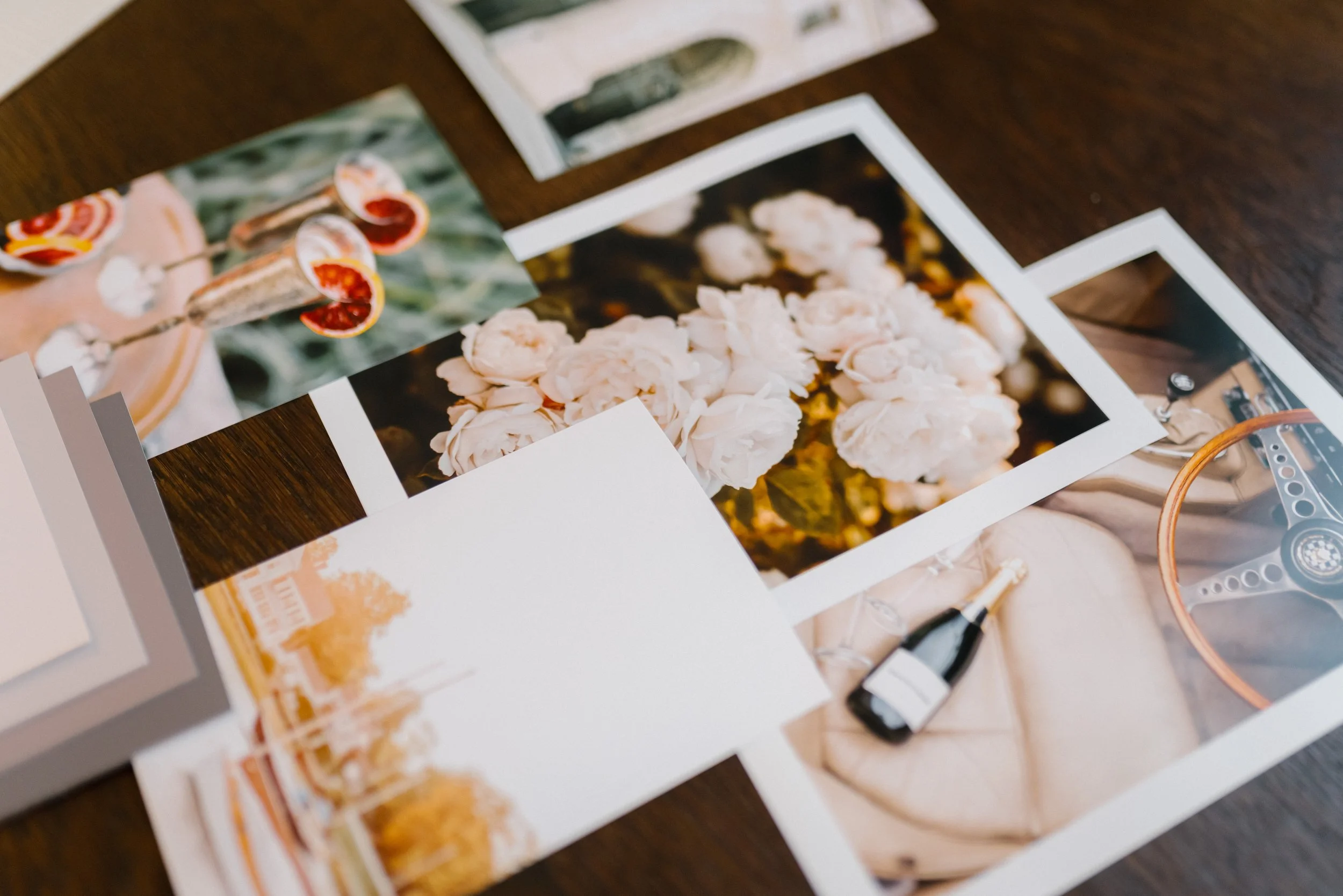 English country house mood board of fabric, floral and colour references laid out on a table