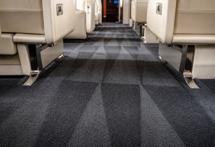 Aircraft cabin aisle carpet after deep shampoo and extraction