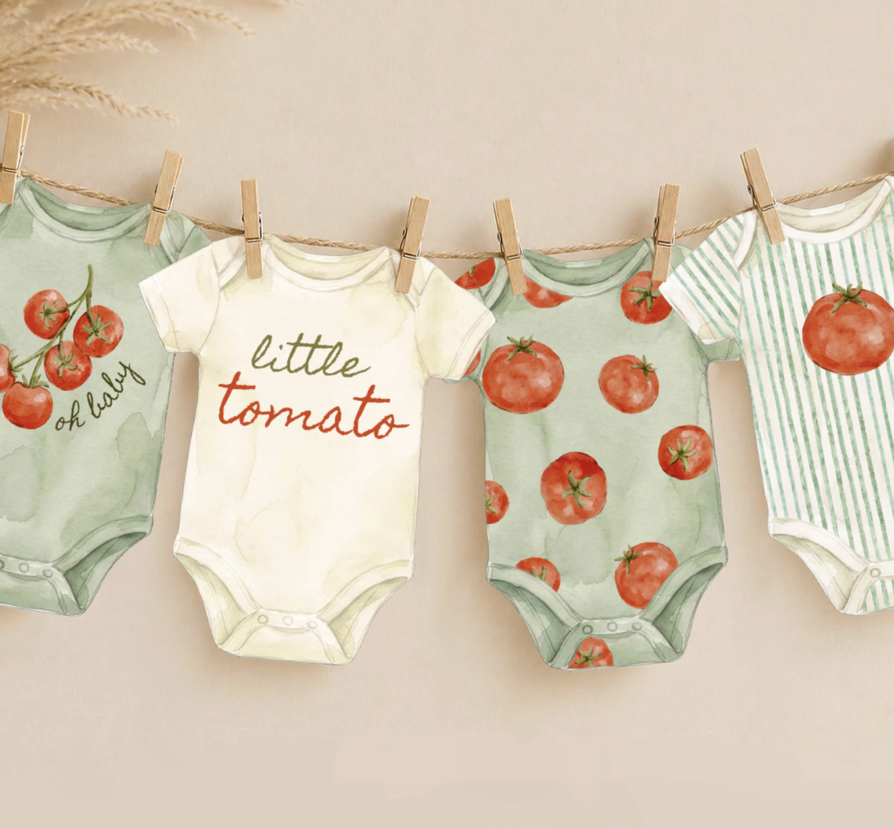 Four baby onesies hanging on a clothesline with clothespins, featuring tomato-themed patterns and text.