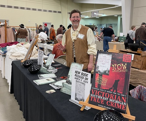 Author Michael Delaware selling books at the Kalamazoo Living History Show in Kalamazoo.