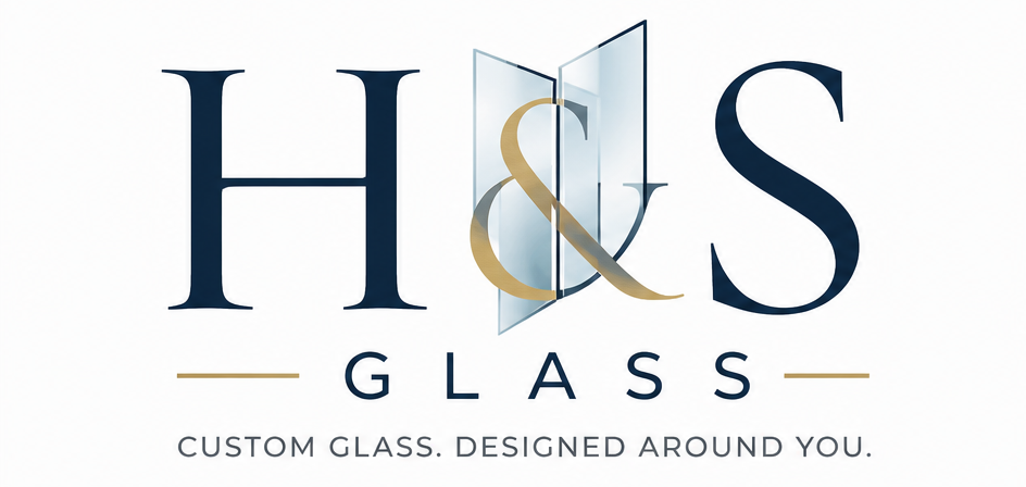 Logo for H & S Glass with a stylized glass pane in the background and the tagline "Custom glass. Designed around you."