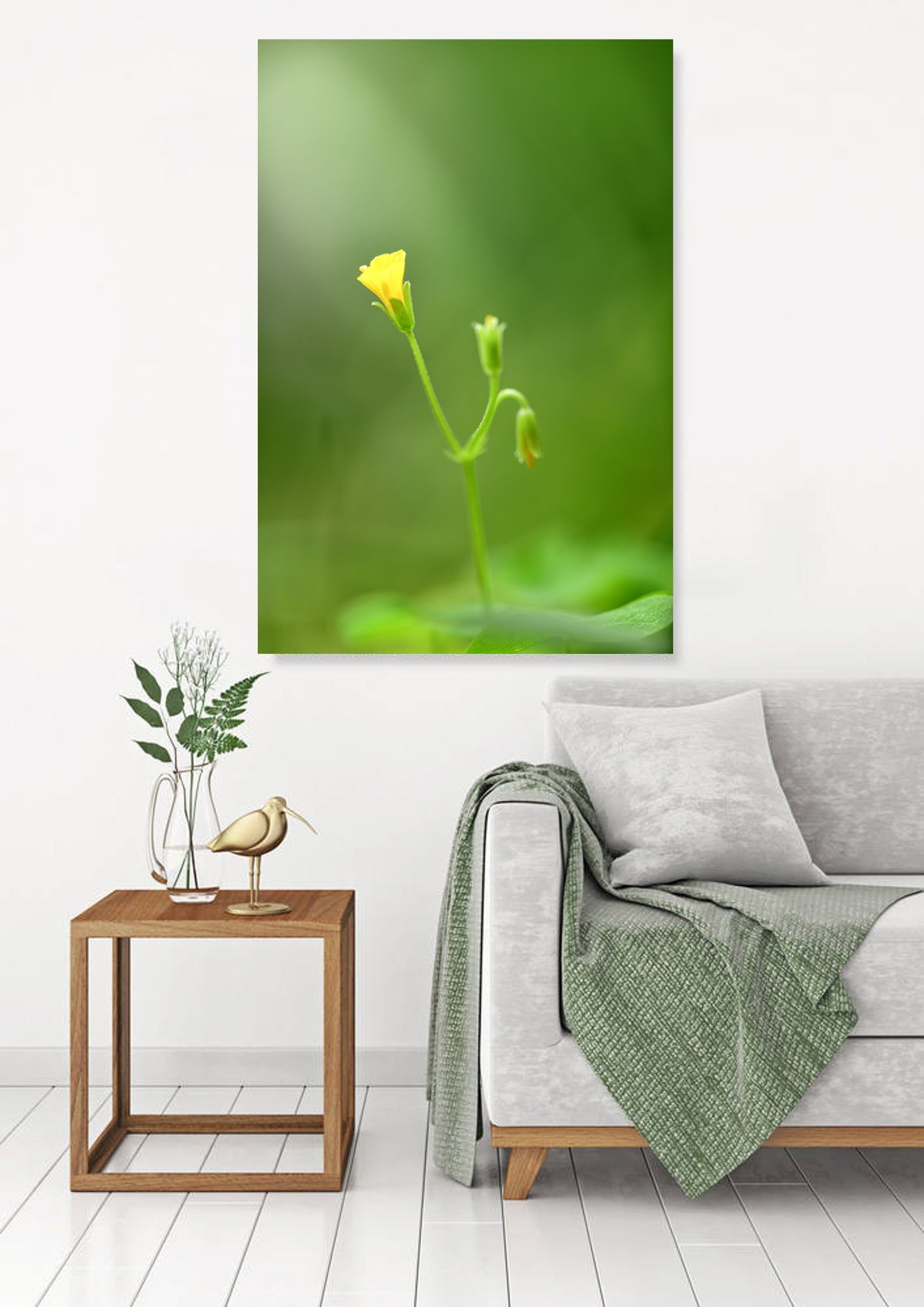 small yellow flower art print on a grey wall