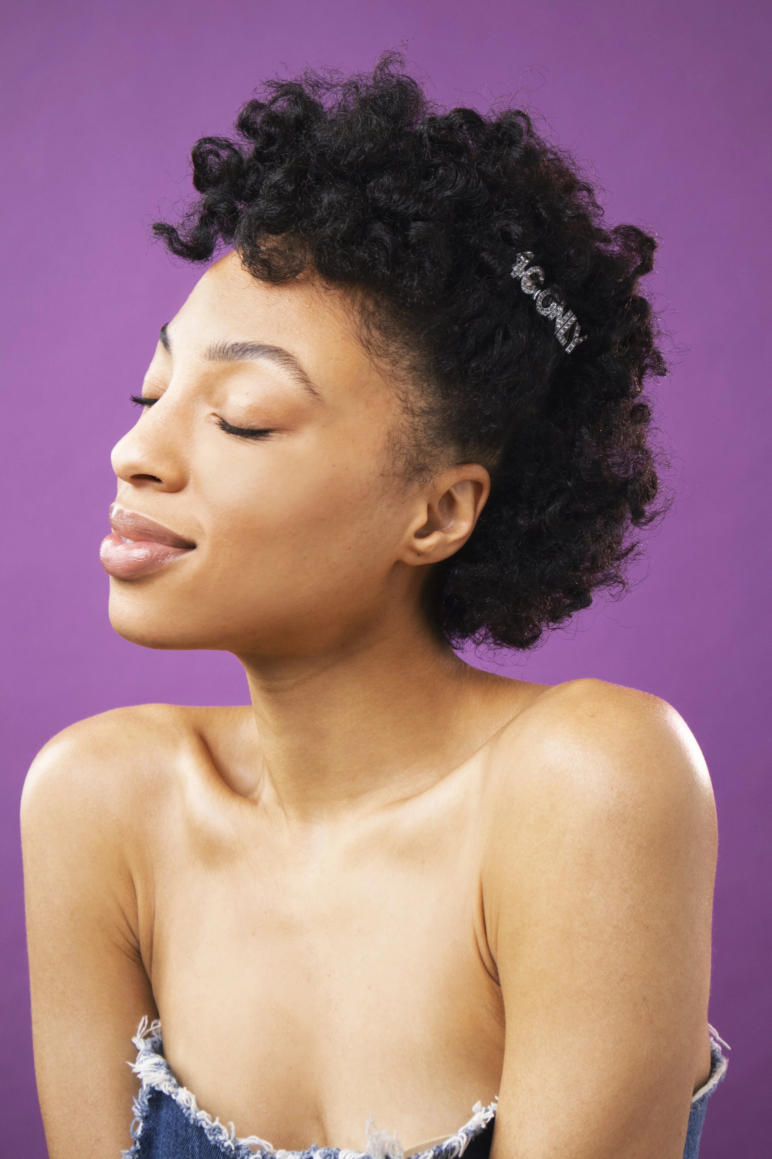 4C ONLY serum campaign portrait against a purple background