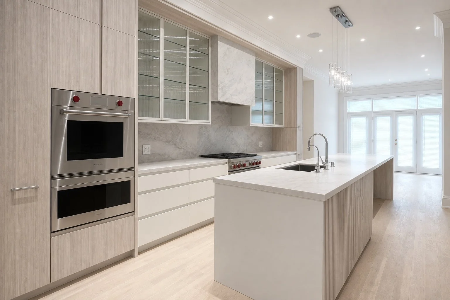 Architectural visualization of the completed Forest Hill kitchen with pale wood cabinetry, reeded-glass uppers, and a long fluted island.