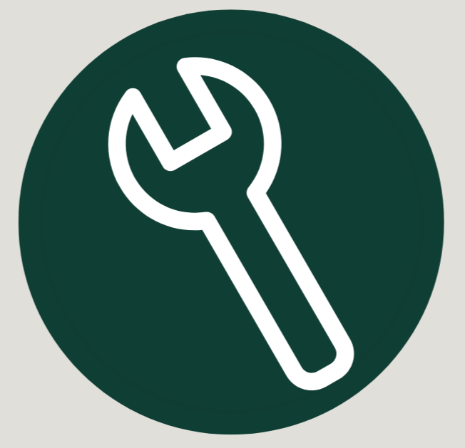 Icon of a wrench and a screwdriver crossed over each other on a dark green circular background