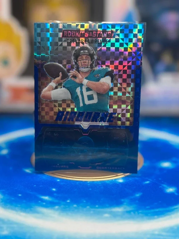 2025 Panini Rookie & Stars Airborne Blue Prizm Trevor Lawrence #6 Jaguars