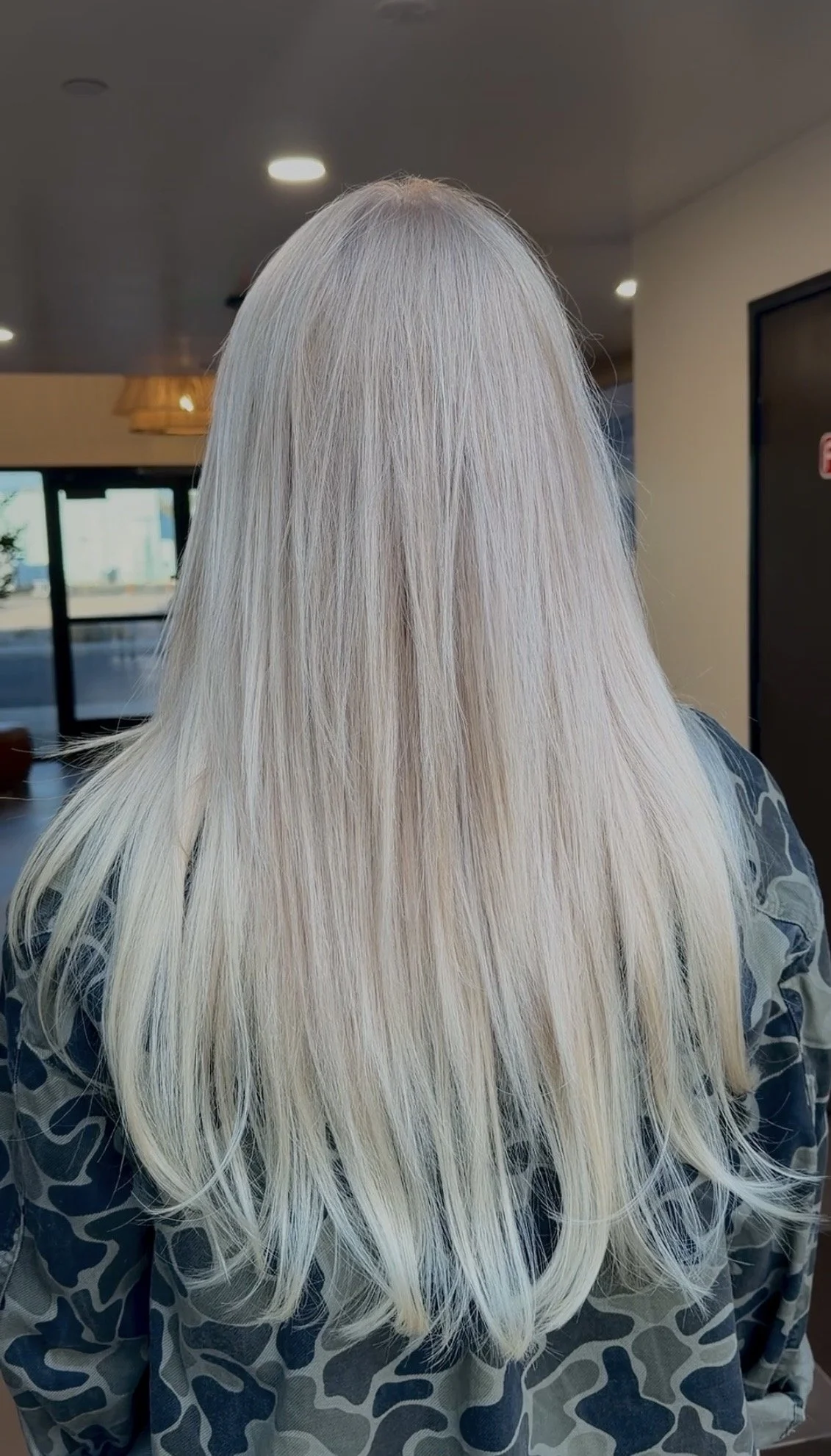Platinum Blonde Highlights and One Row of Beaded Weft Extensions for Volume and Length