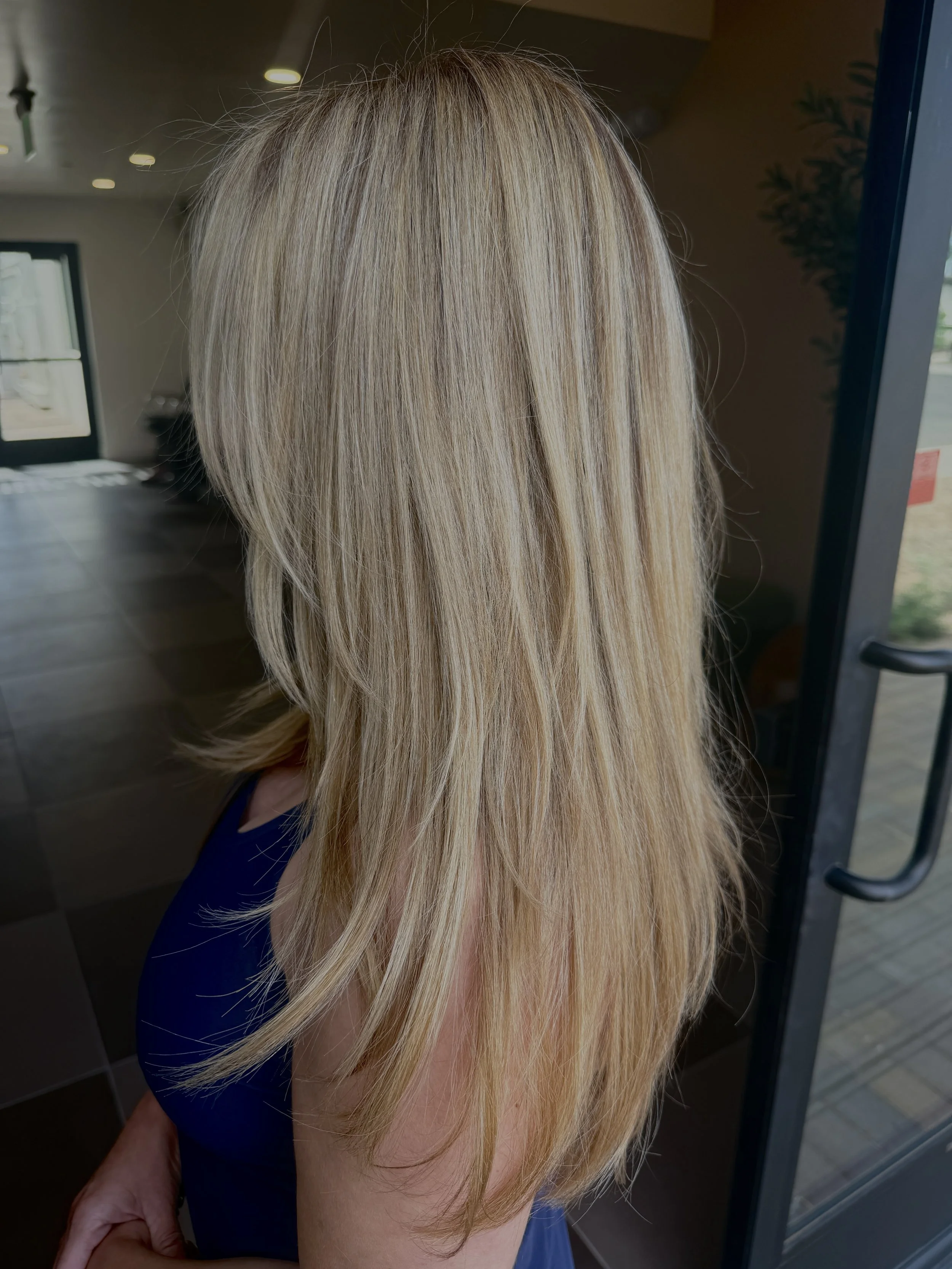 Bright Blonde Highlights and Long Layered Haircut