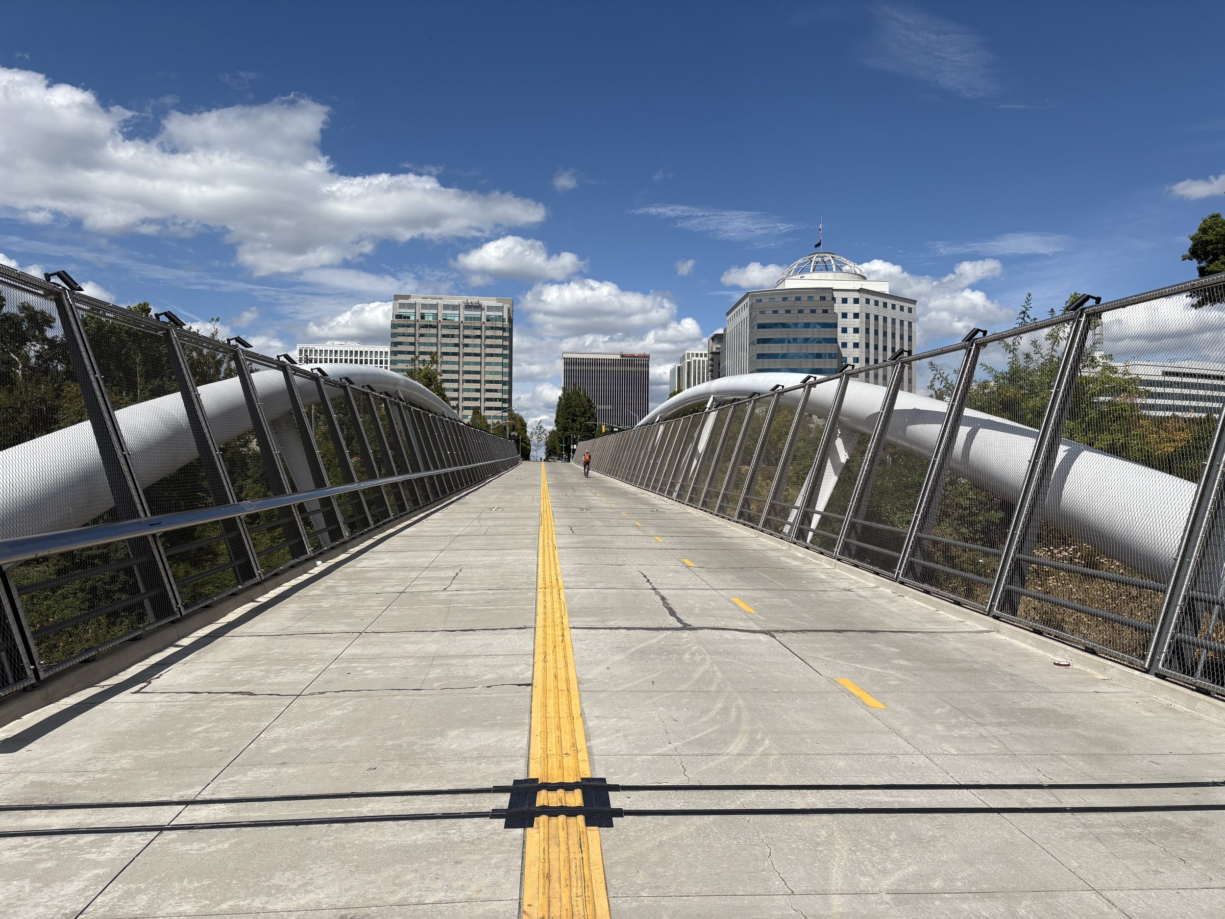 the blumenauer bicycle and pedestrian bridge in Portland, OR connects the central Eastside of the city to the Lloyd district crossing over I-84